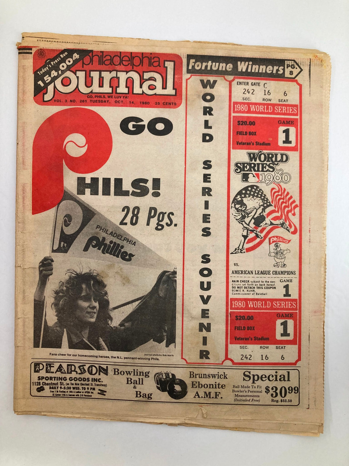 Front cover of the Philadelphia Journal Tabloid from October 14, 1980, featuring a bold headline 'GO PHILS!' and details of the 1980 World Series, celebrating the Philadelphia Phillies.