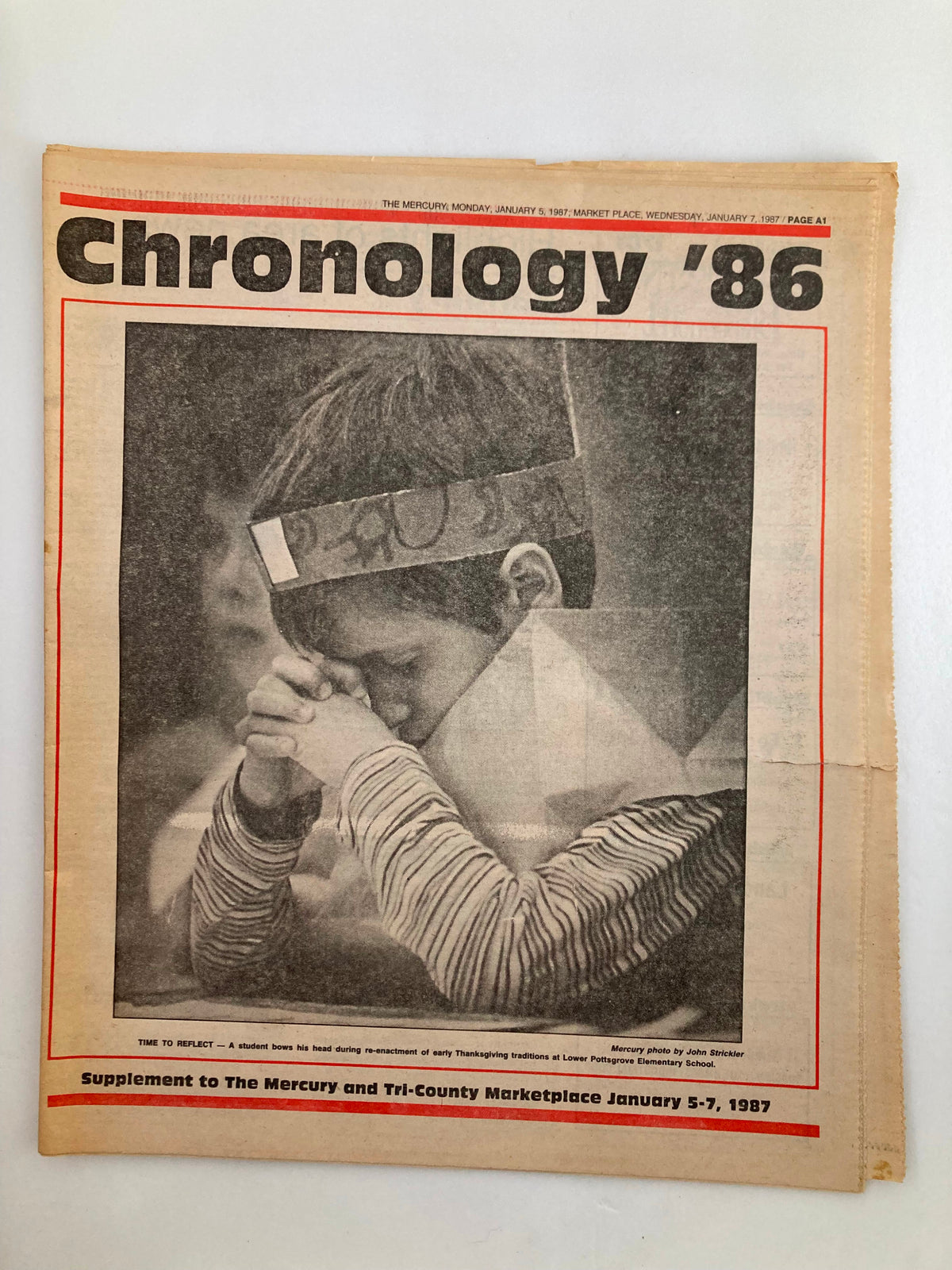 Cover image of The Mercury Supplementary Tabloid from January 5, 1987, titled 'Chronology '86', featuring a child with a solemn expression, reflecting on events of 1986.