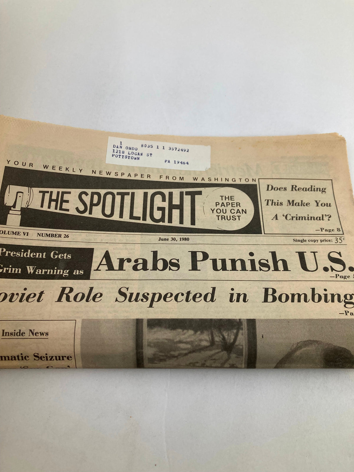 Close-up view of The Spotlight Newspaper June 30 1980 Vol 6 #26, prominently displaying headlines about political issues and public sentiments.