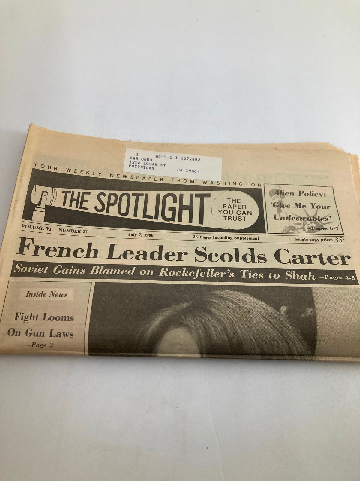 The Spotlight Newspaper dated July 7, 1980, Volume 6, Number 27, featuring the headline 'Deborah Davis' Books Were Killed'. The newspaper is in good condition with minor wear, includes a label on the front, and is protected by plastic covering.
