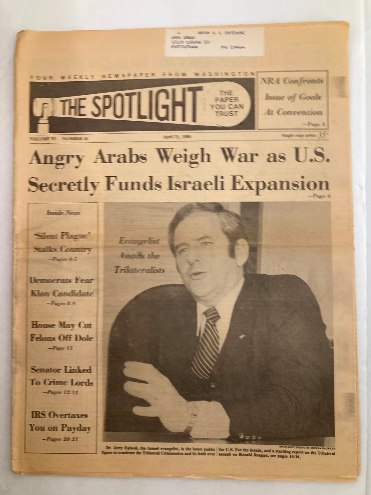 The Spotlight Newspaper from April 21, 1980, featuring headlines about Dr. Jerry Falwell, the Silent Plague, and geopolitical issues. The image showcases the newspaper's front page with prominent articles and a photograph of Falwell.