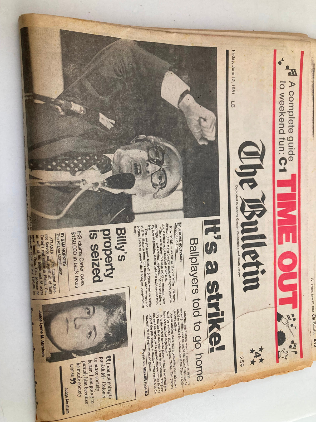The Bulletin Newspaper from June 12, 1981 features a striking headline 'It's a strike!' along with coverage of various events including baseball players being told to go home. The newspaper is folded and shows signs of age.