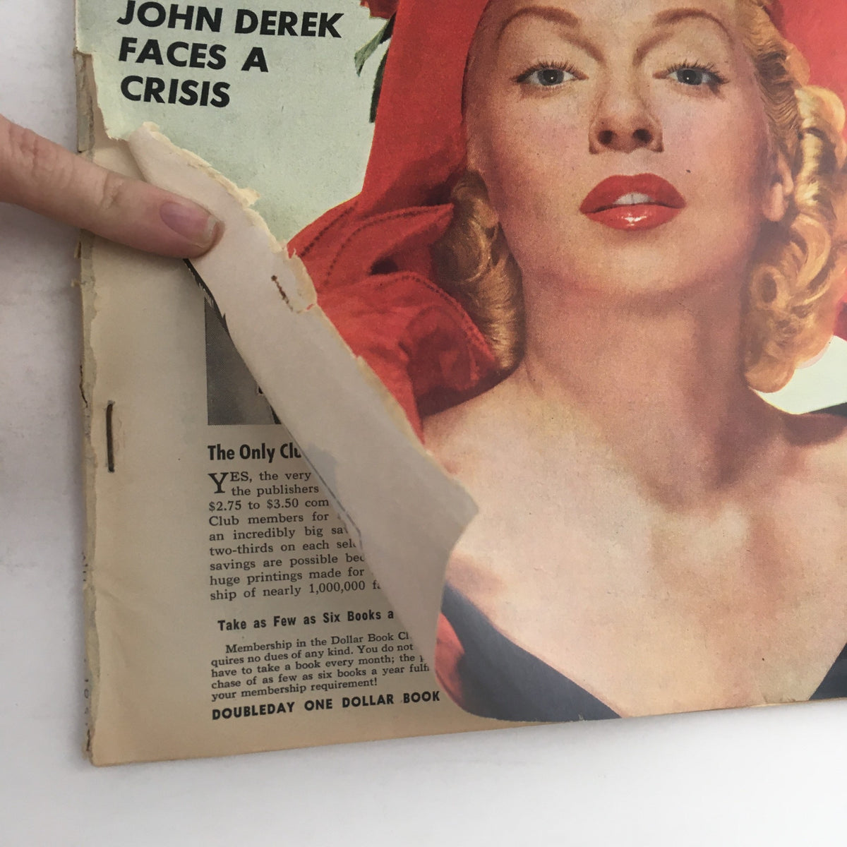 Back cover of VTG Movieland August 1951 showing Lana Turner with a glamorous look, alongside promotional text and details about the Dollar Book Club offer.