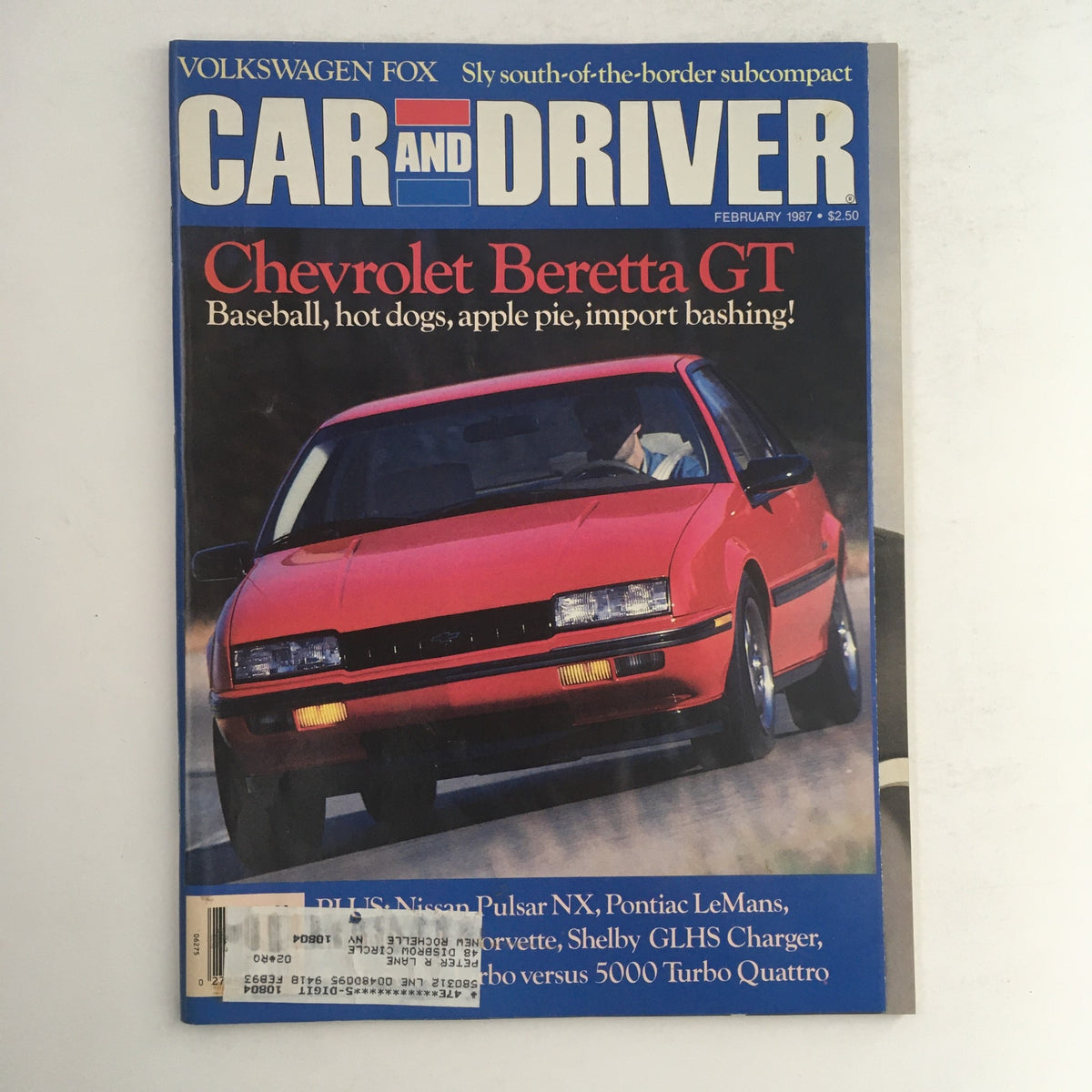 Cover of Car & Driver Magazine February 1987 featuring the Chevrolet Beretta GT and Volkswagen Fox, showcasing automotive culture and trends from the 1980s.