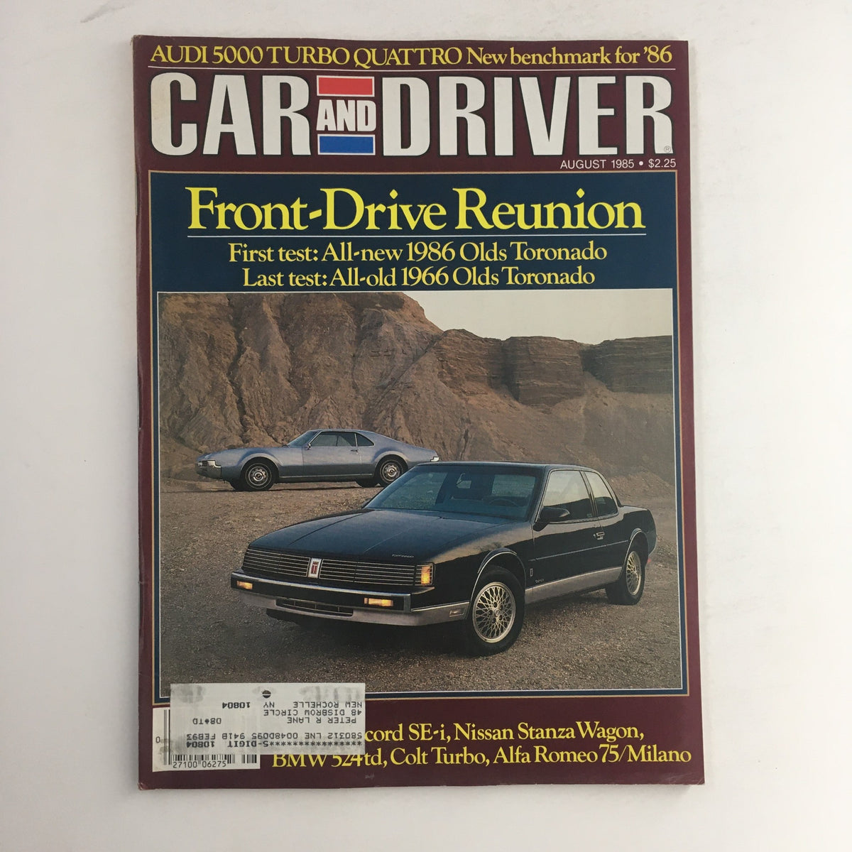 Car & Driver Magazine August 1985 featuring Nissan Stanza Wagon and Alfa Romeo 75/Milano on the cover, showcasing vintage automotive design and features.