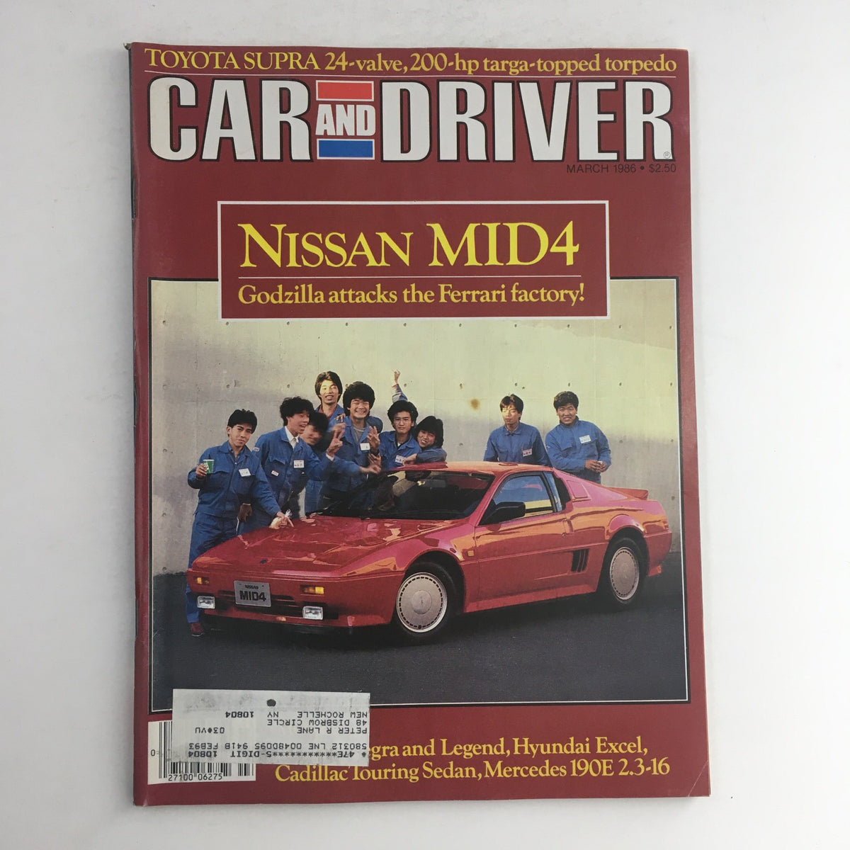 Car & Driver Magazine March 1986 cover featuring the Nissan Mid4 and a group of men celebrating, highlighting key automotive topics of the issue including the Toyota Supra and Hyundai Excel.