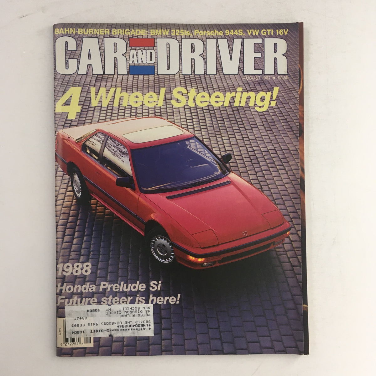 Cover of Car & Driver Magazine August 1987 featuring the Honda Prelude and Bahn-Burner Brigade, highlighting 4 Wheel Steering technology. The magazine showcases a red Honda Prelude on a cobblestone background along with eye-catching headlines.