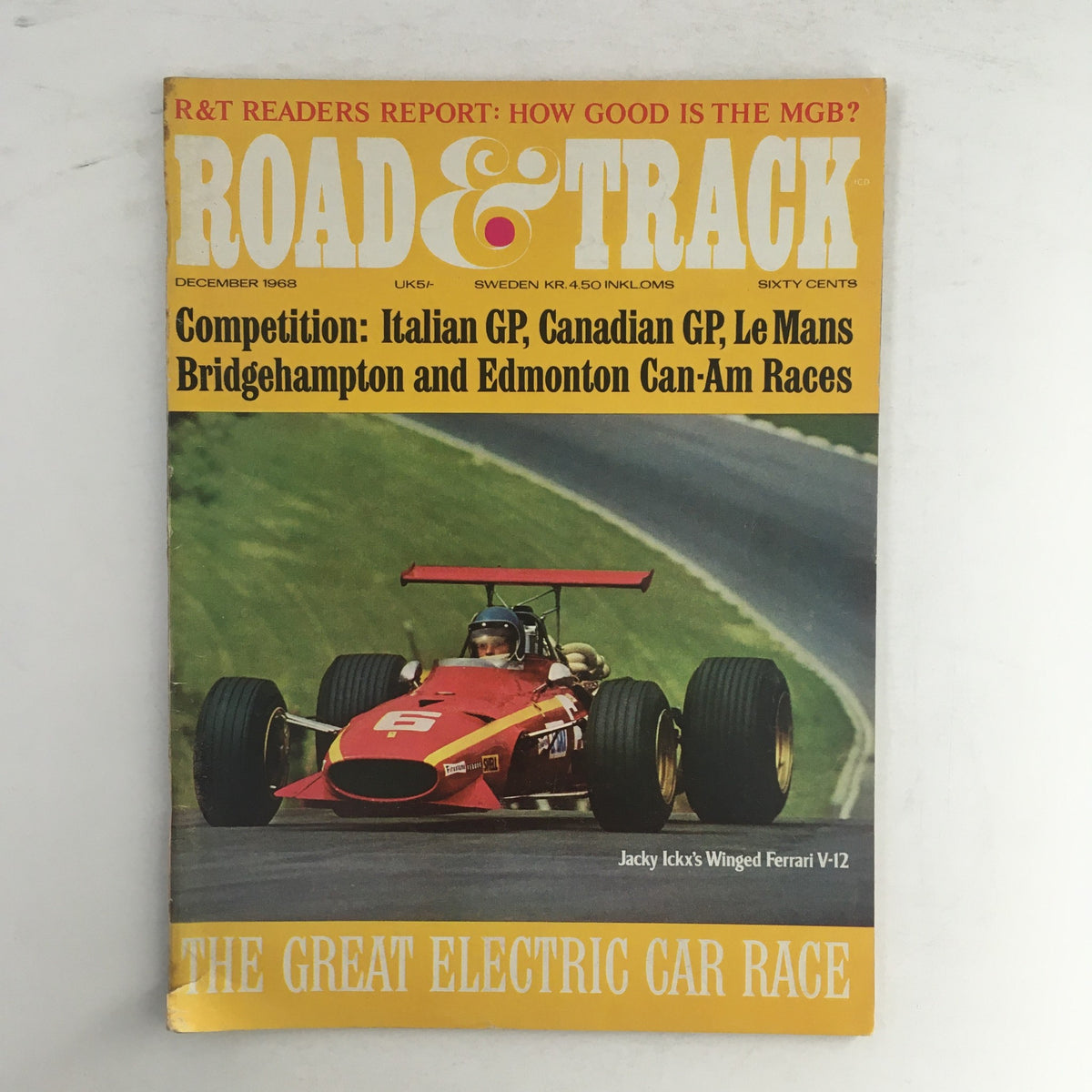 Cover of Road & Track Magazine December 1968 featuring Jacky Ickx's Winged Ferrari V-12, showcasing automotive excellence and vintage design.
