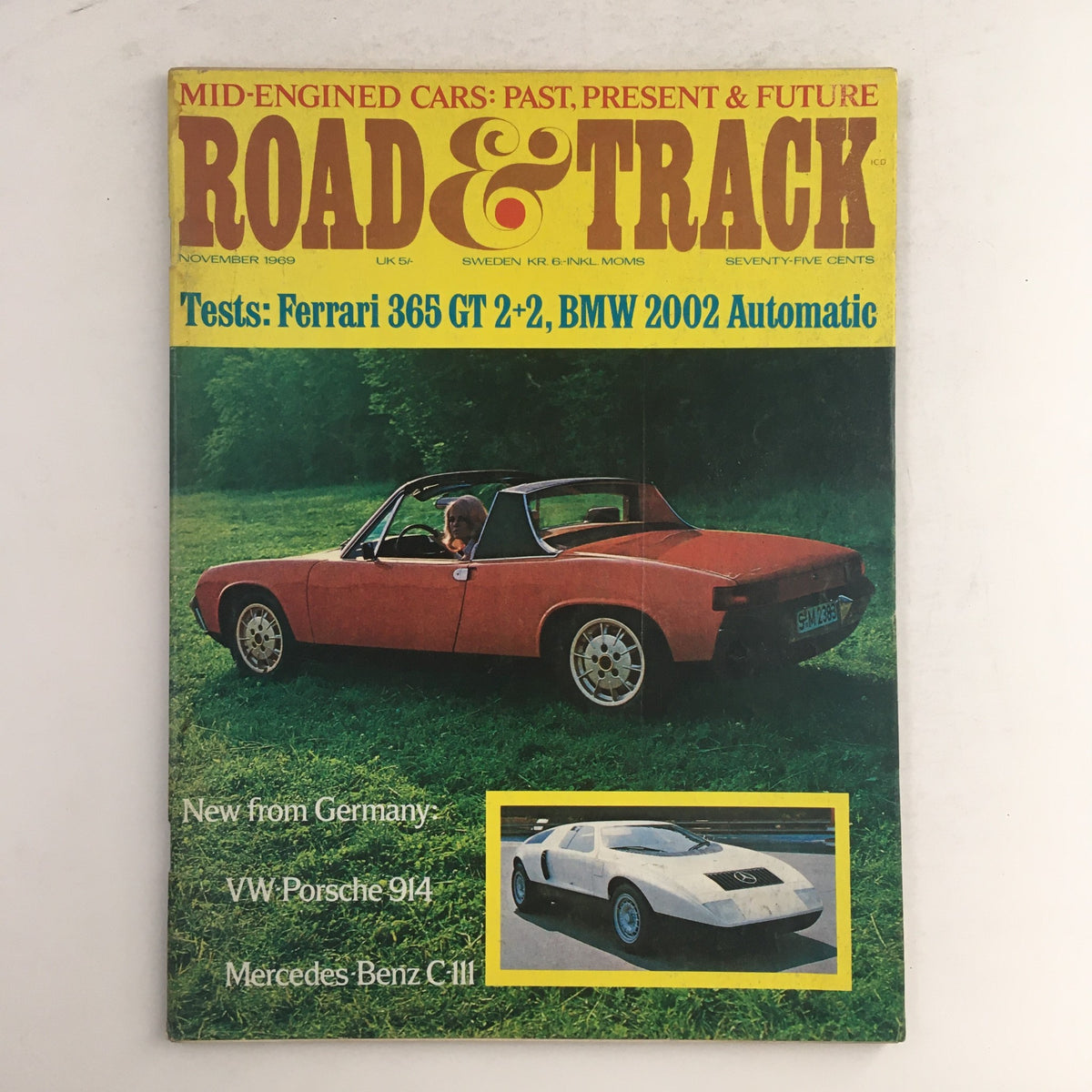 Cover of Road & Track Magazine - November 1969 featuring tests on Ferrari 365 GT 2+2 and BMW 2002 Automatic, showcasing classic automotive designs and performances.