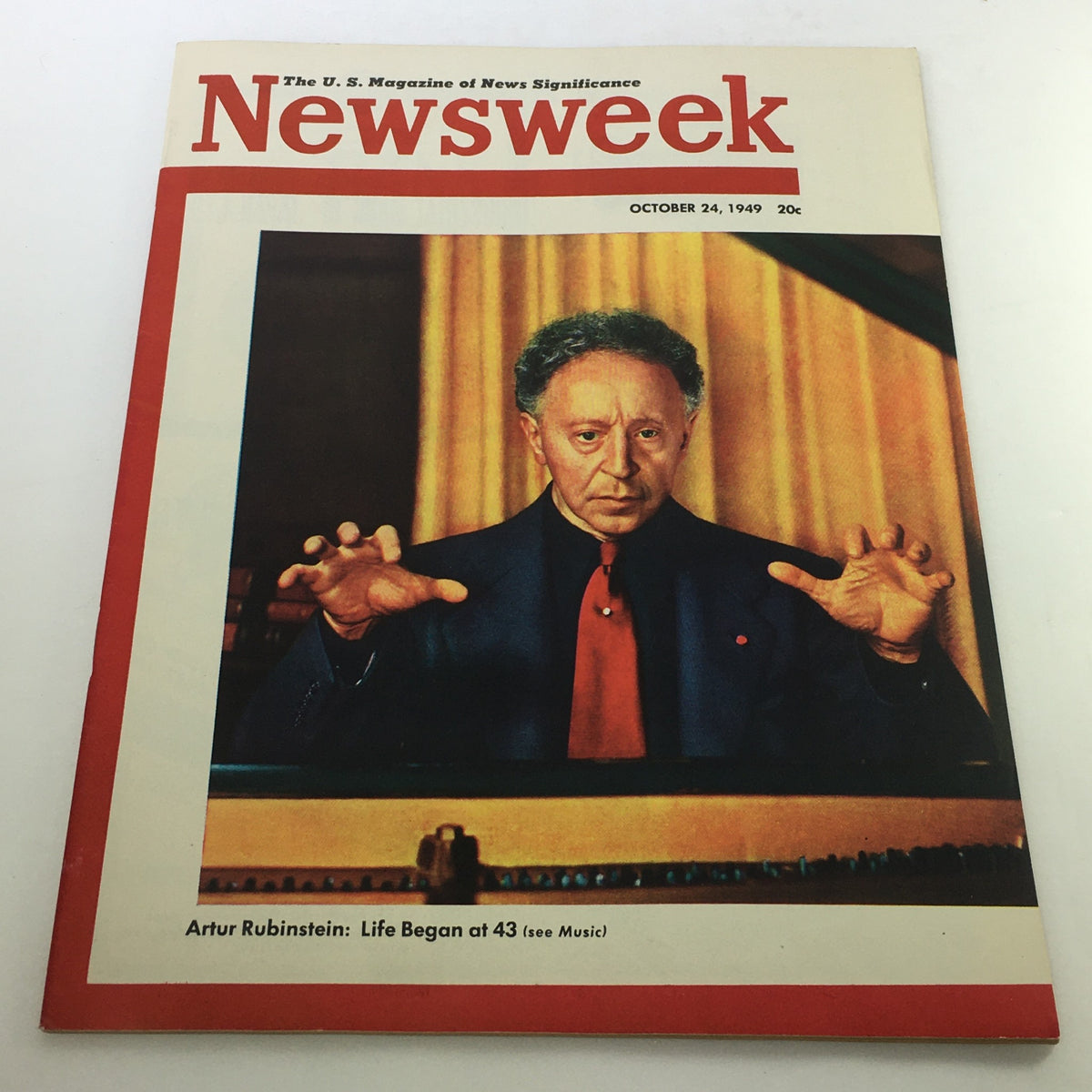 Cover of the vintage Newsweek magazine from October 24, 1949, featuring renowned pianist Artur Rubinstein. The magazine highlights article titled 'Artur Rubinstein: Life Began at 43', showcasing the artist in a dramatic pose.