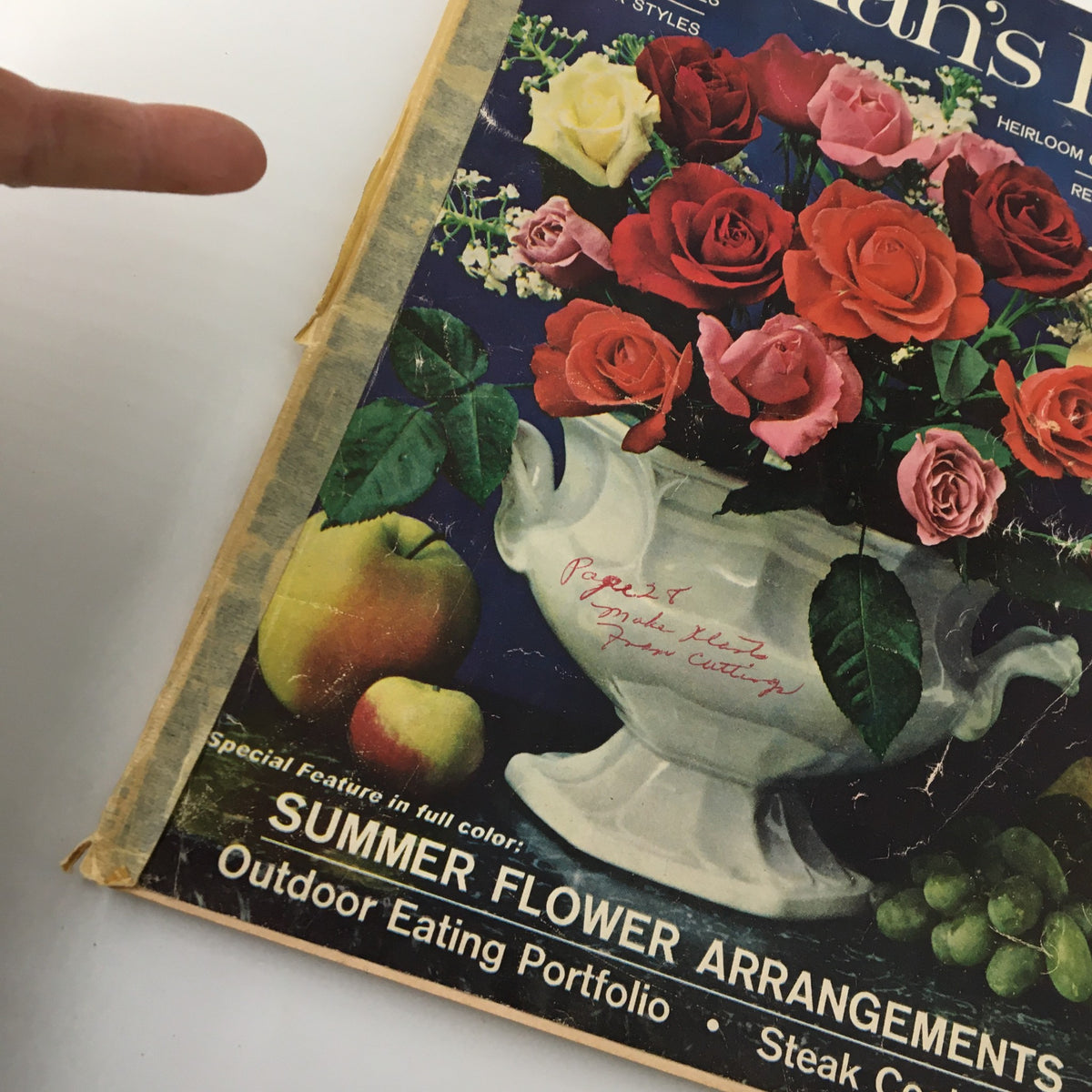 Detail of VTG Woman's Day Magazine June 1963 cover highlighting summer flower arrangements and a handwritten note, emphasizing vintage charm.