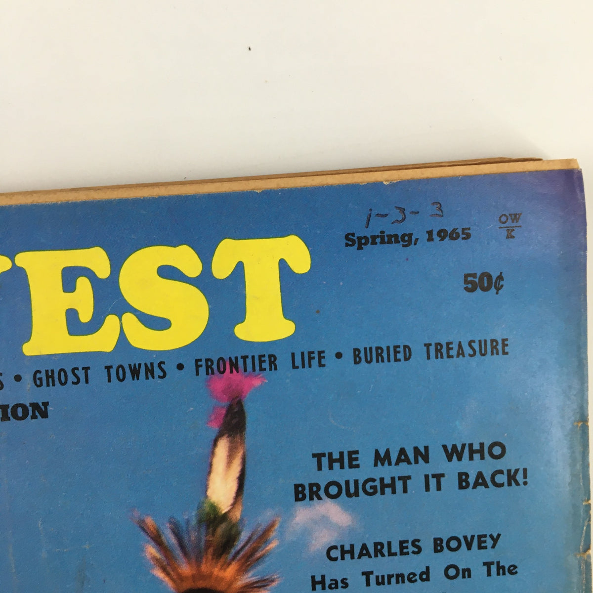 Cover of VTG Old West Magazine Spring 1965 featuring vibrant colors and the title prominently displayed, showcasing the theme of the Wild West and an image indicative of the era.