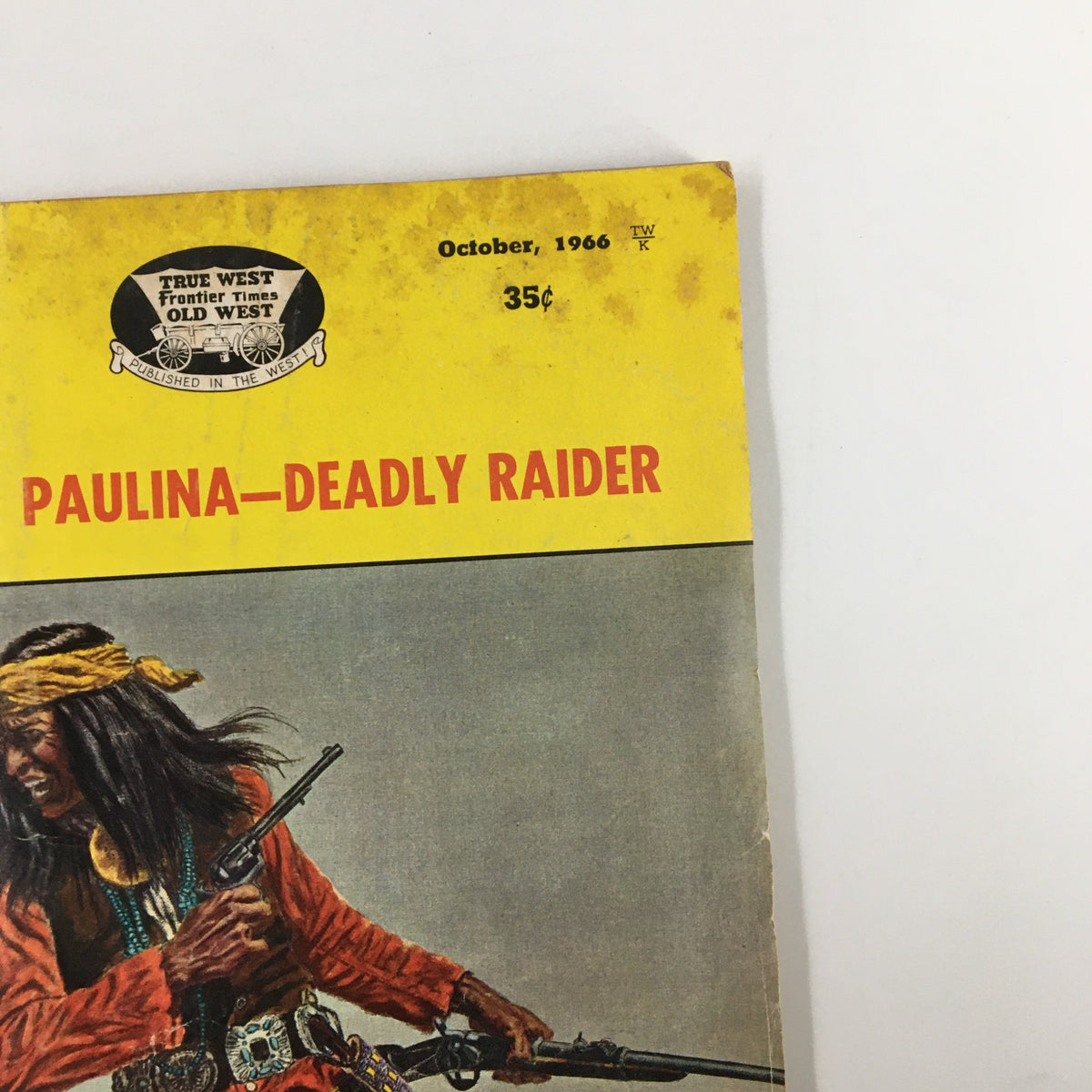 Detailed view of the top section of True West Magazine, October 1966, highlighting the title 'Paulina - Deadly Raider' and the magazine price of 35 cents, set against a yellow background.