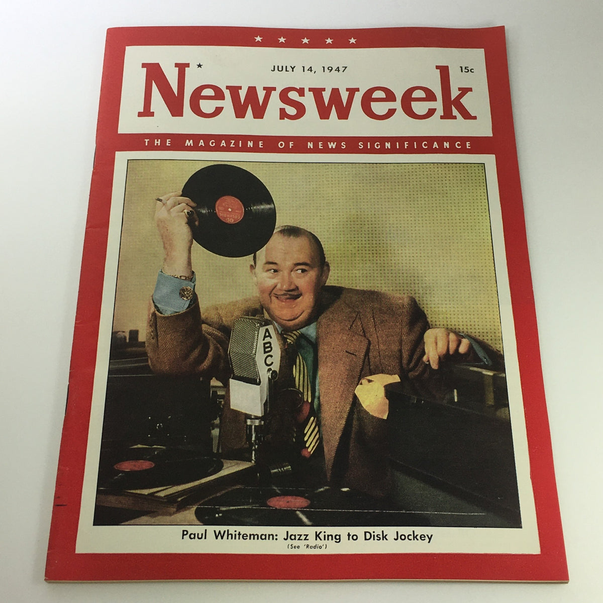 VTG Newsweek Magazine July 14 1947 featuring Paul Whiteman, the Jazz King, holding a vinyl record in front of a microphone, showcasing the golden era of jazz music.