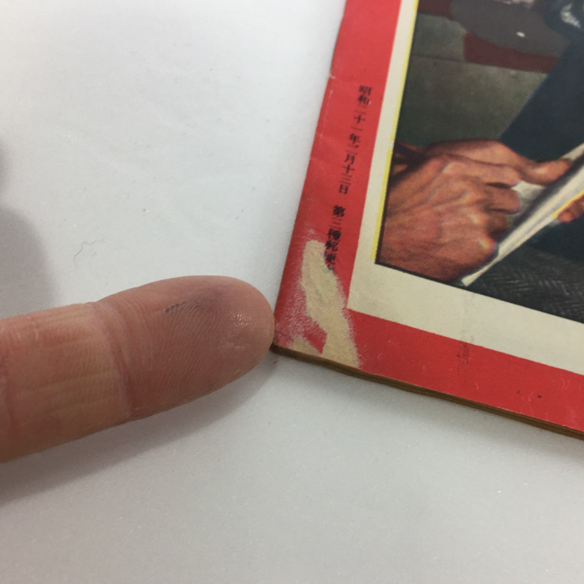 Close-up detail of the cover of VTG Newsweek Magazine April 19 1948, illustrating signs of wear and age, including a damaged corner, perfect for collectors of vintage publications.