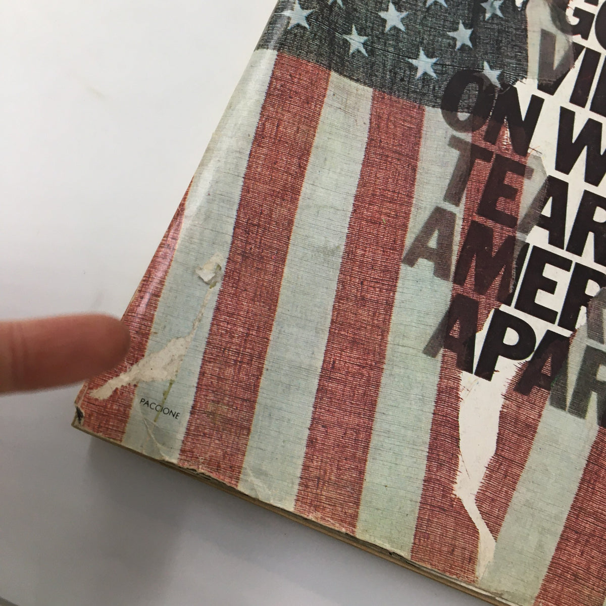 Close-up of the cover of VTG Esquire Magazine May 1975 showing damage on the edge and highlighting the title 'On Who's Tearing America Apart' by Gore Vidal.