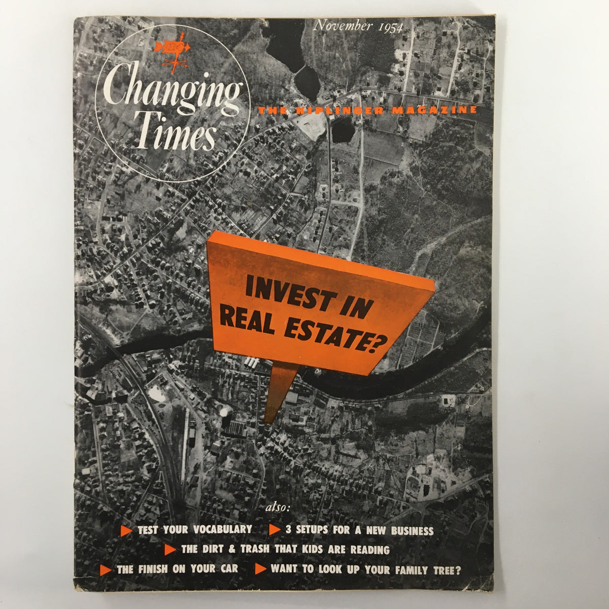 VTG Changing Times Magazine November 1954 cover featuring the headline 'Invest in Real Estate?' along with a vintage map background, showcasing historical context and advertisements from the era.