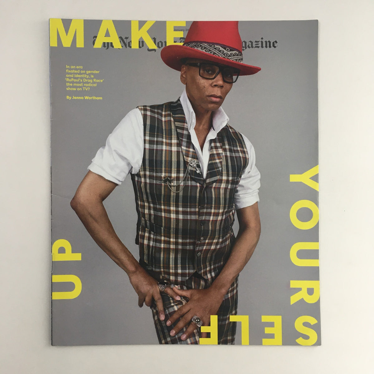 Cover of The New York Times Magazine January 28, 2018 featuring 'RuPaul's Drag Race'. The cover showcases RuPaul in vibrant attire including a red hat and plaid outfit, with bold text stating 'MAKE YOURSELF UP'.