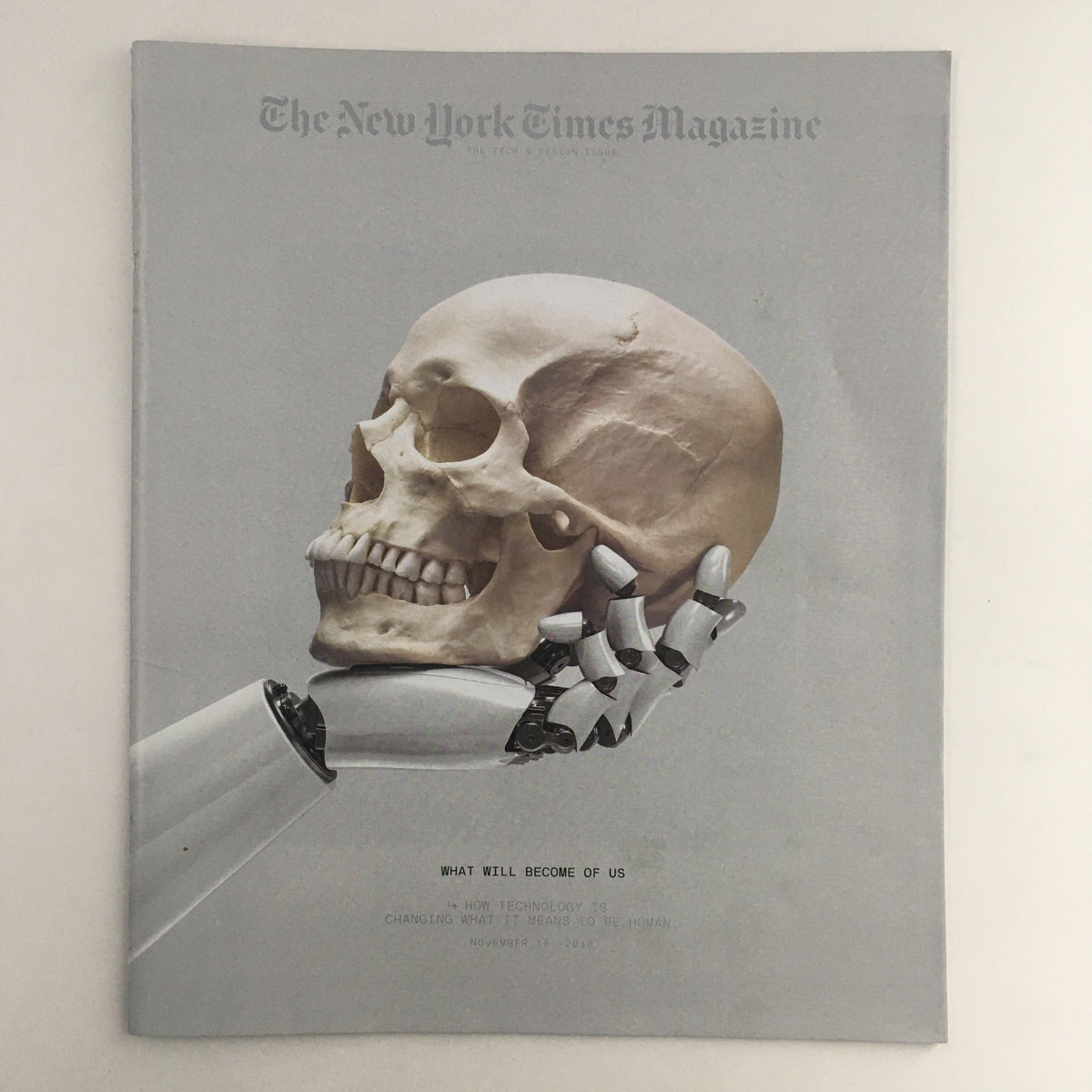 Cover of The New York Times Magazine from November 18, 2018, featuring a human skull and a robotic hand, illustrating the theme 'What Will Become of Us' in relation to technology and humanity.