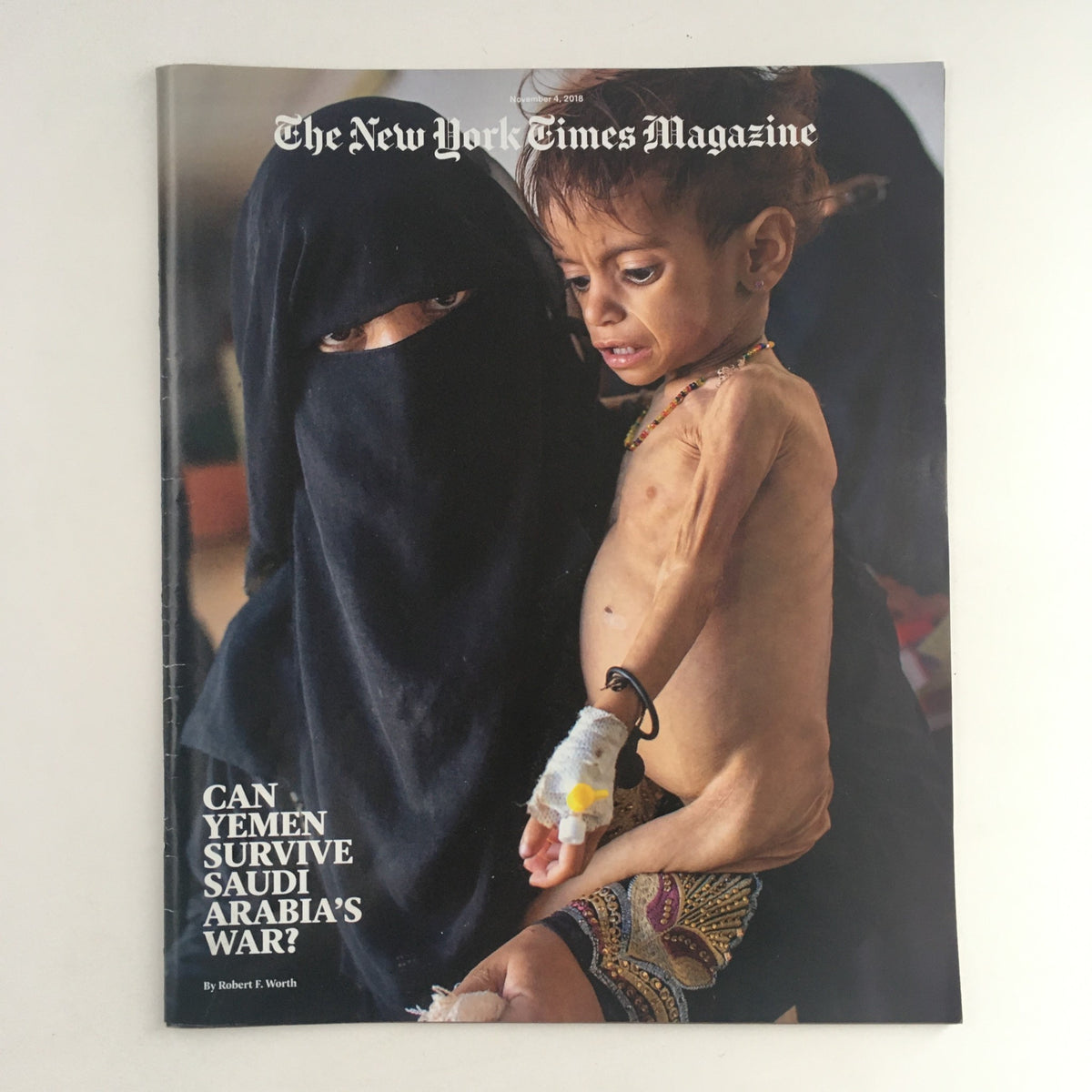 Cover of The New York Times Magazine dated November 4, 2018, featuring a poignant image of a mother and child in Yemen, with the headline "Can Yemen Survive Saudi Arabia's War?" highlighting the humanitarian crisis.