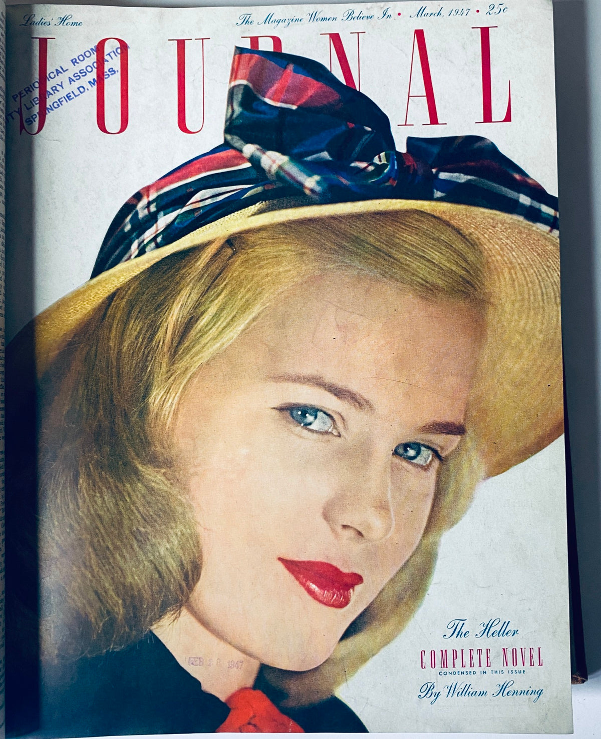 March 1947 cover of Ladies' Home Journal, portraying a glamorous woman with a hat and bold red lips.
