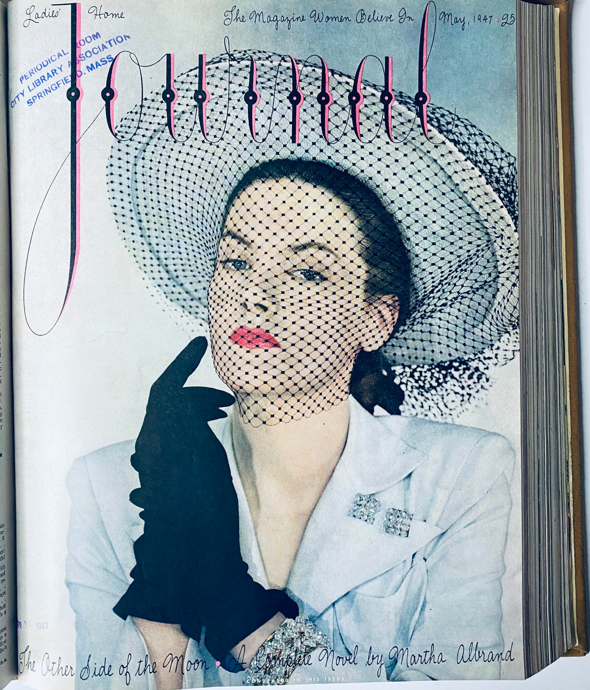 Cover of Ladies' Home Journal, May 1947 edition, showcasing a fashionable woman wearing a large hat and gloves.