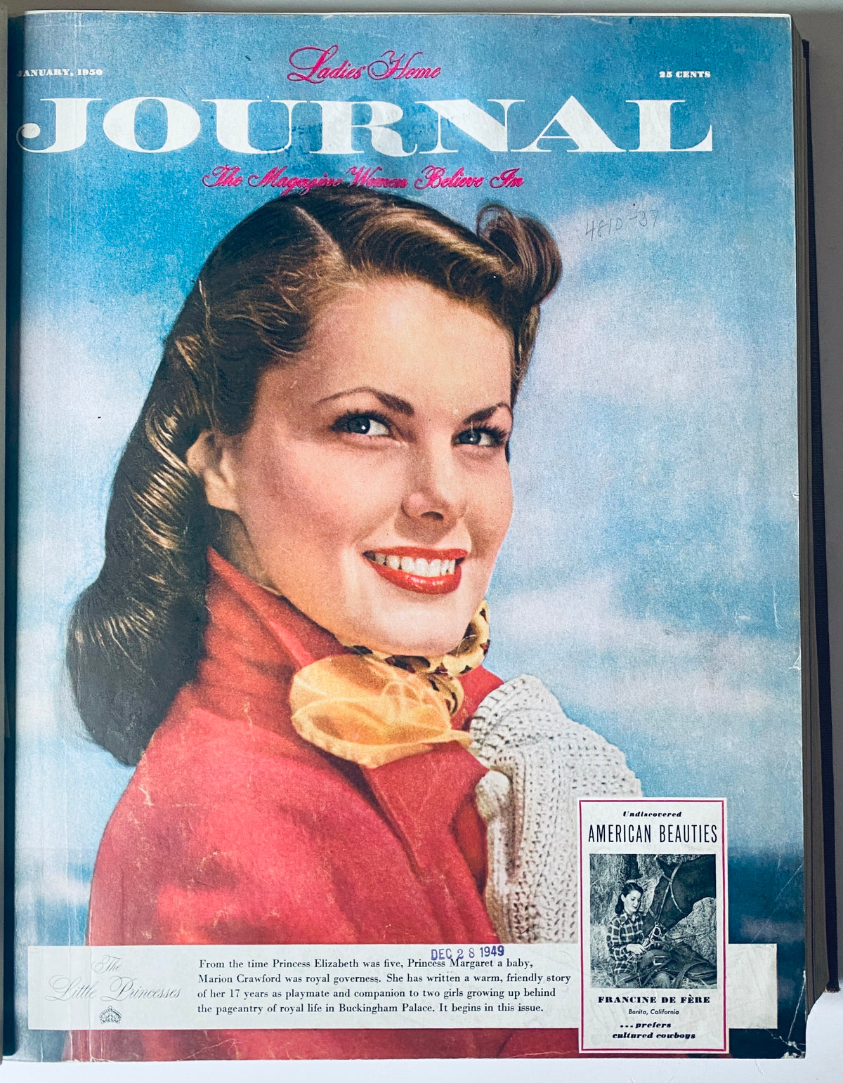 Cover of the January 1950 Ladies' Home Journal showcasing a woman with a scarf, representing early 1950s fashion and lifestyle.