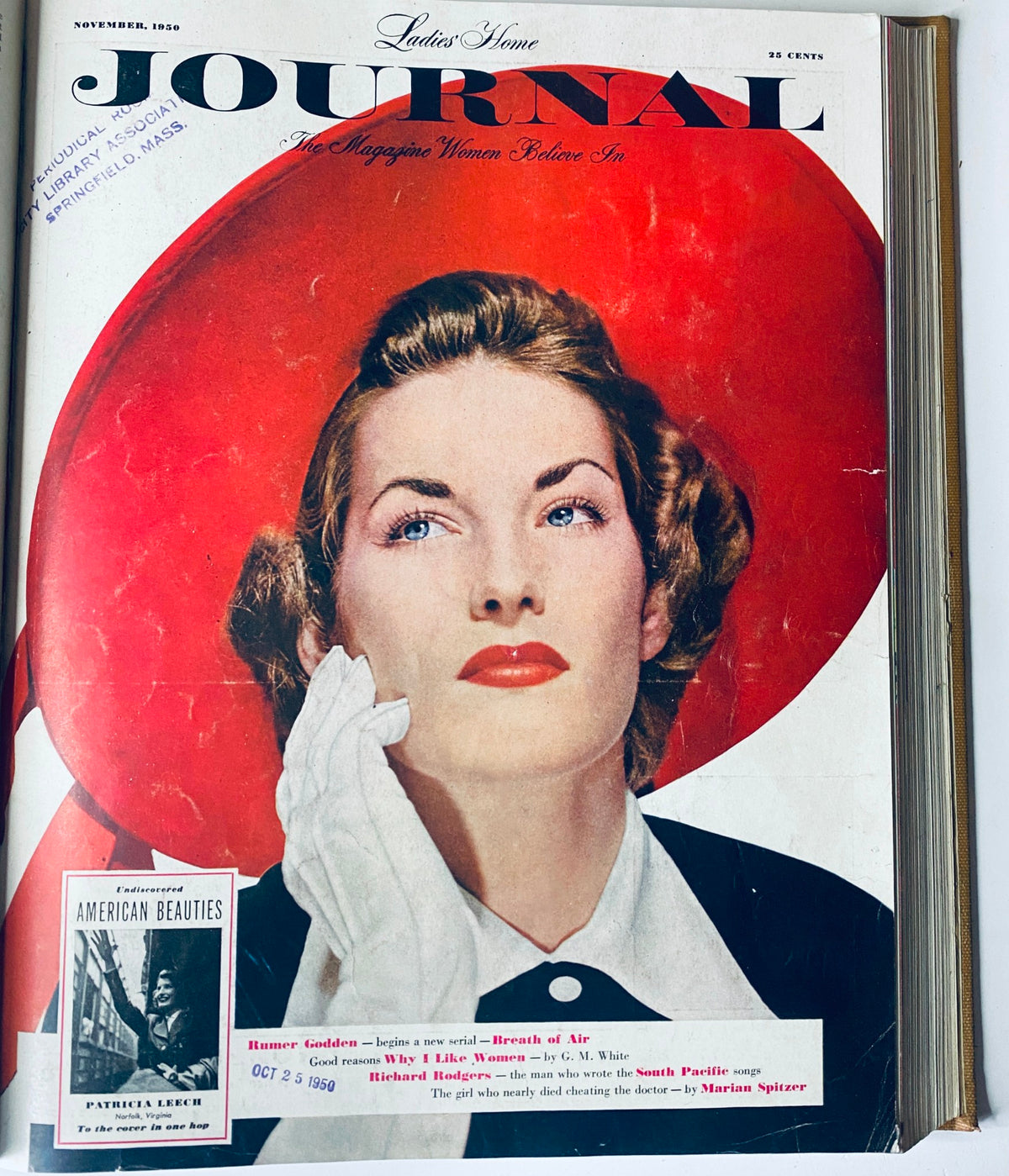 Ladies' Home Journal magazine cover from November 1950, displaying a glamorous woman with a striking red hat. This cover reflects the fashion trends and aesthetics of the era.