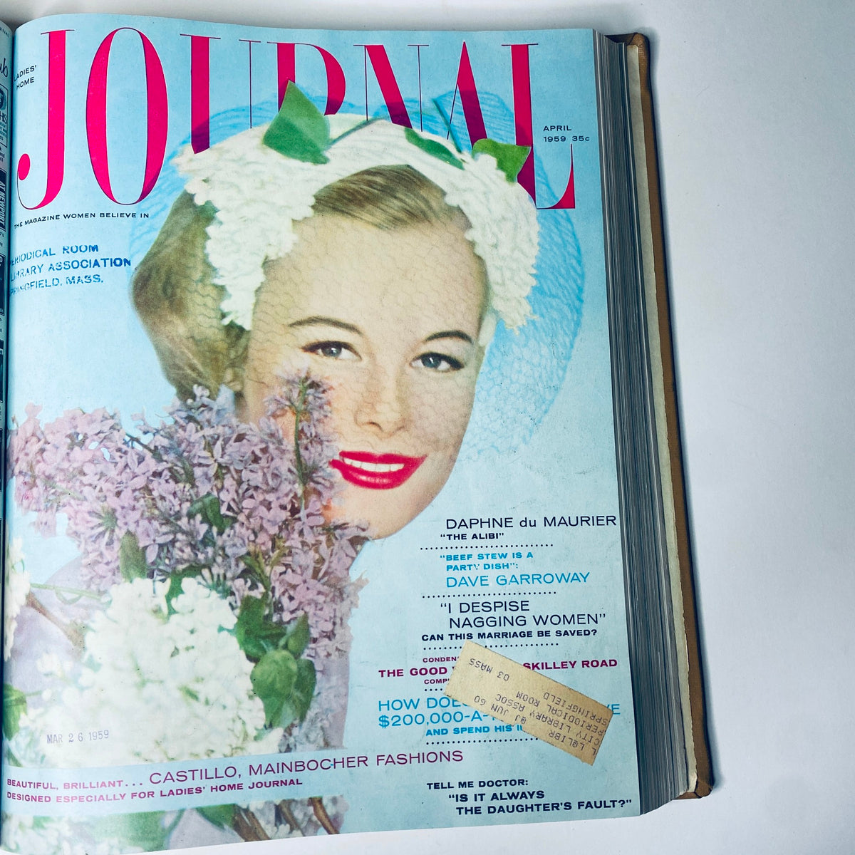 Cover of Ladies' Home Journal, April 1959 issue, featuring a young woman wearing a floral headpiece and smiling, showcasing vibrant 1950s fashion and cultural trends.