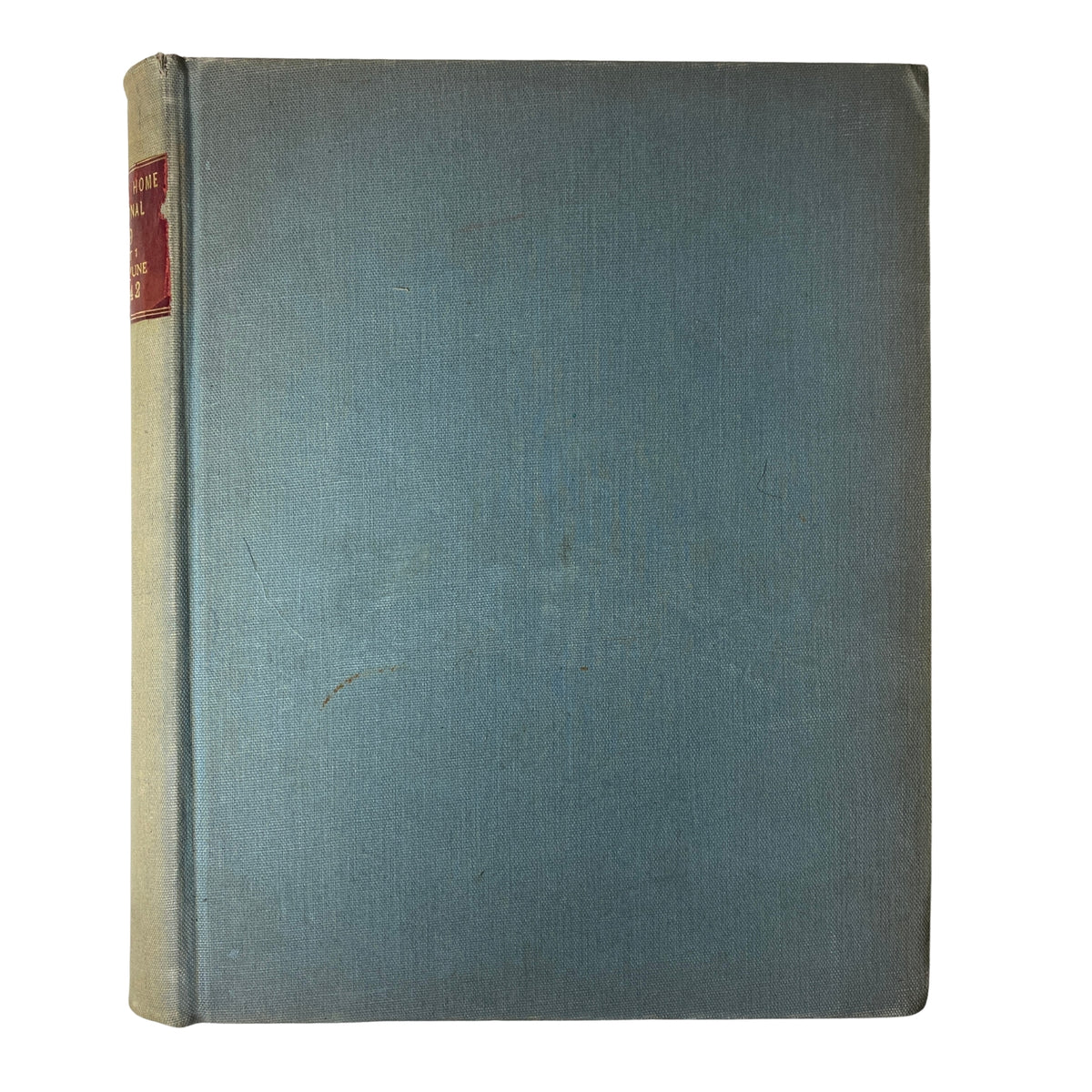 Ladies' Home Journal Library Bound Magazine 1942 showcasing the back cover of a blue bound volume, with a gold label for identification.