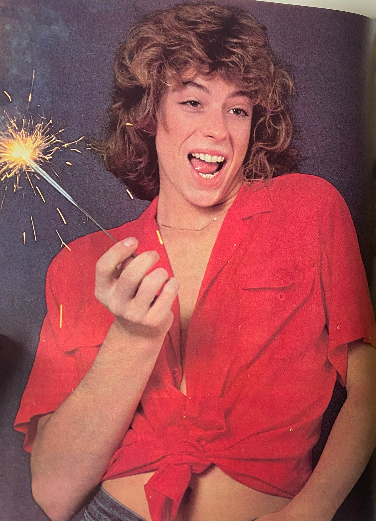 Color page from Tiger Beat Magazine July 1980, displaying Shawn Cassidy celebrating summer with a sparkler.