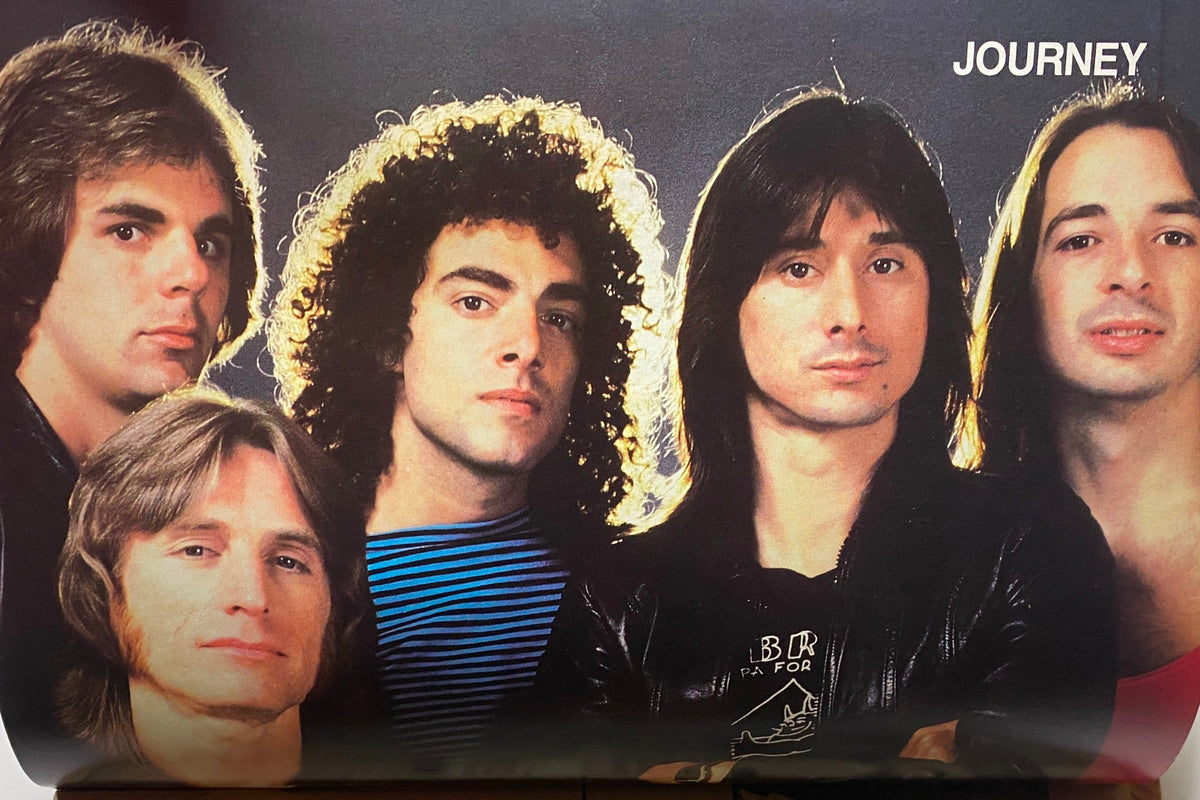 Tiger Beat Magazine September 1982 article featuring the rock band Journey with members posing together, showcasing their iconic hairstyles.