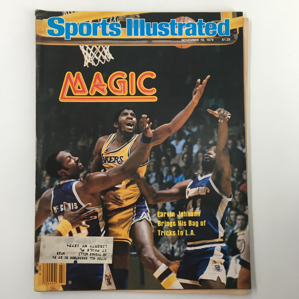 Cover of Sports Illustrated Magazine from November 19, 1979, featuring Earvin 'Magic' Johnson, showcasing his dynamic play style with action shots against opposing players.