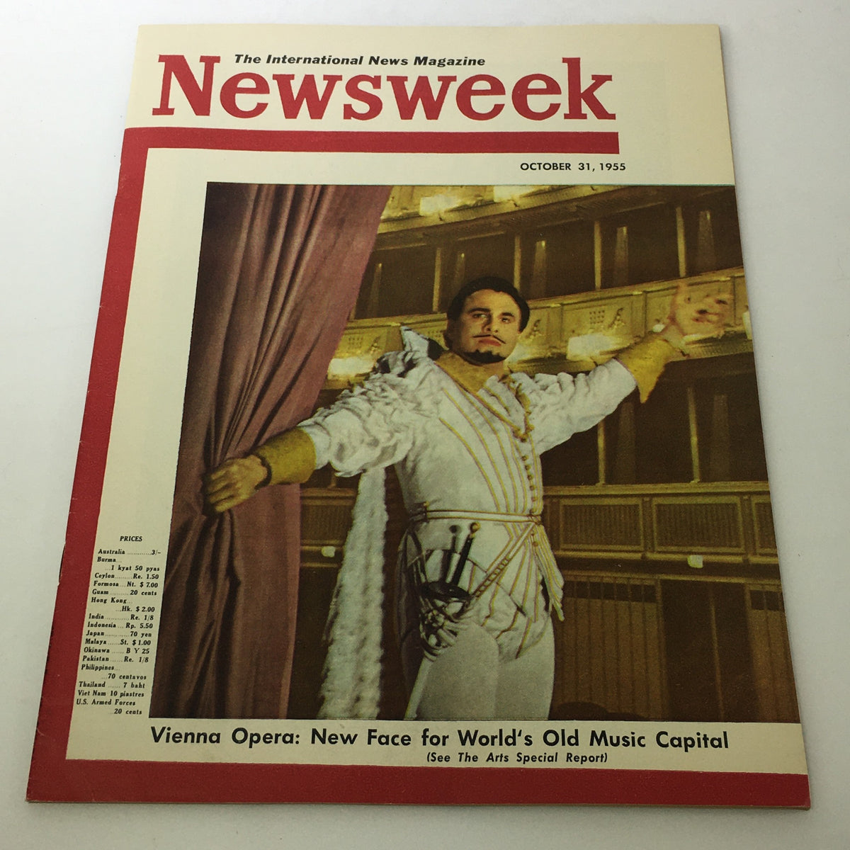 Cover of the vintage Newsweek magazine from October 31, 1955, featuring the title 'Vienna Opera: New Face for World's Old Music Capital'. The image shows a male performer in an elaborate costume, standing on stage, ready to entertain, symbolizing Vienna's rich operatic tradition.
