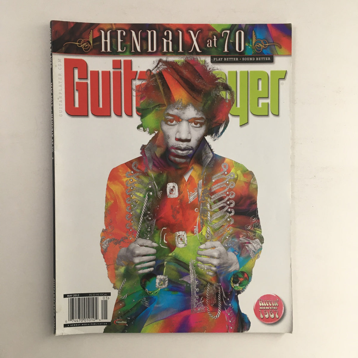 Cover of Guitar Player Magazine May 2012 featuring iconic American musician Jimi Hendrix in vibrant colors and artistic design, showcasing his influence in rock music.