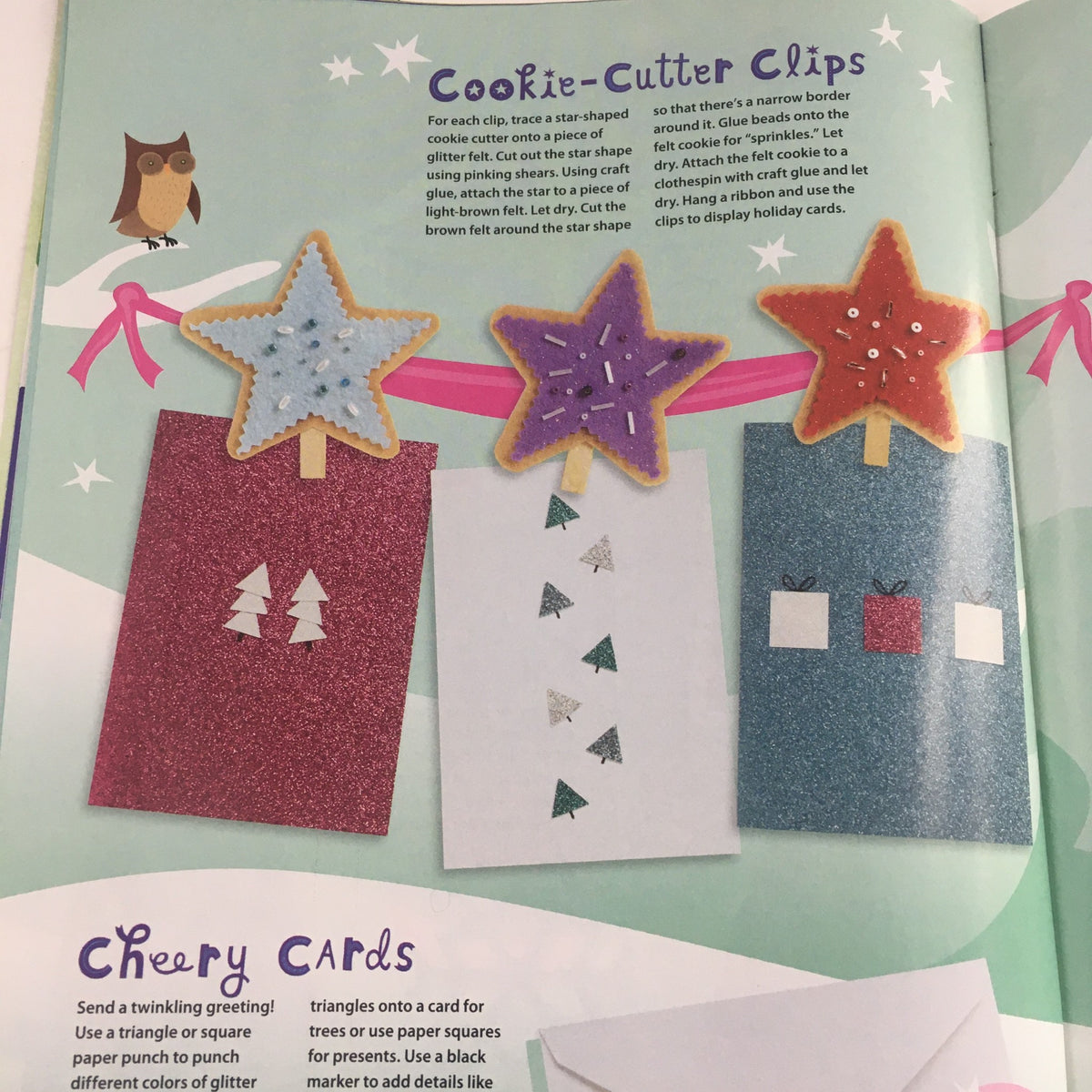 Creative holiday decorations from American Girl Magazine November 2010, displaying cookie-cutter clips holding cheerful holiday cards.