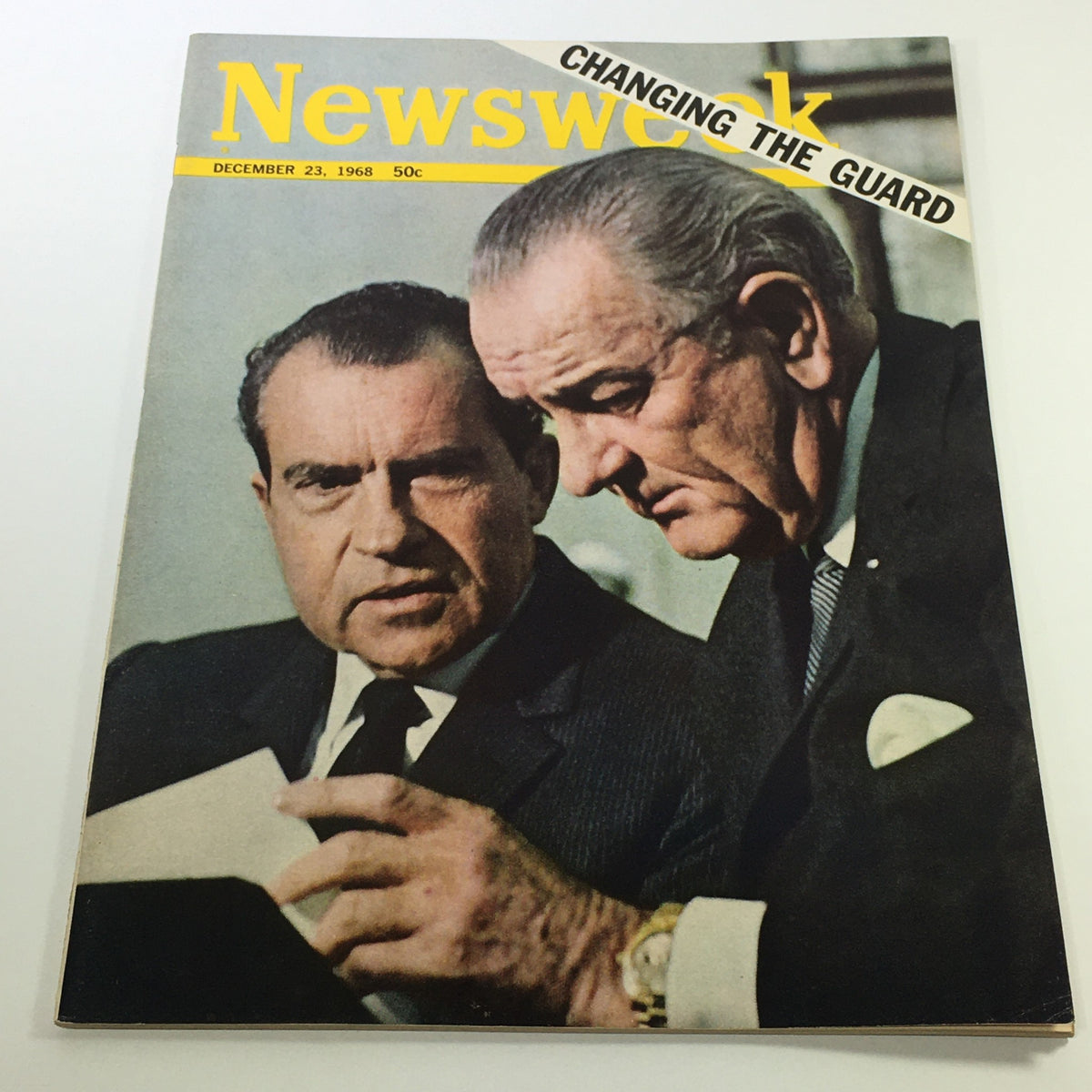 Cover of Vintage Newsweek Magazine from December 23, 1968, featuring Richard Nixon and Henry Kissinger, depicting a significant moment in American history with the headline 'CHANGING THE GUARD'.