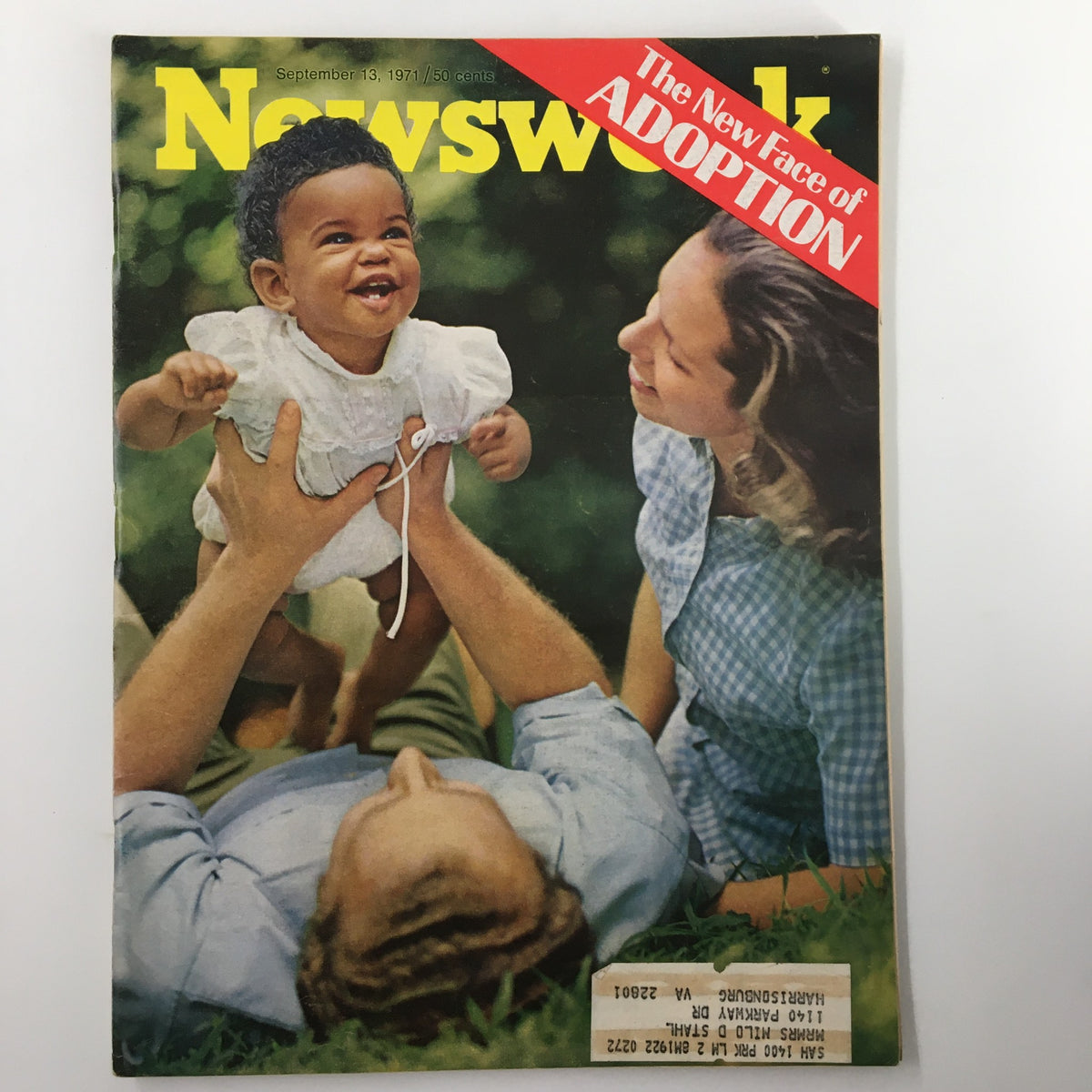 Vintage Newsweek magazine cover from September 13, 1971, featuring the title 'The New Face of Adoption.' The image depicts a joyful baby being lifted by a parent, symbolizing themes of family and adoption.