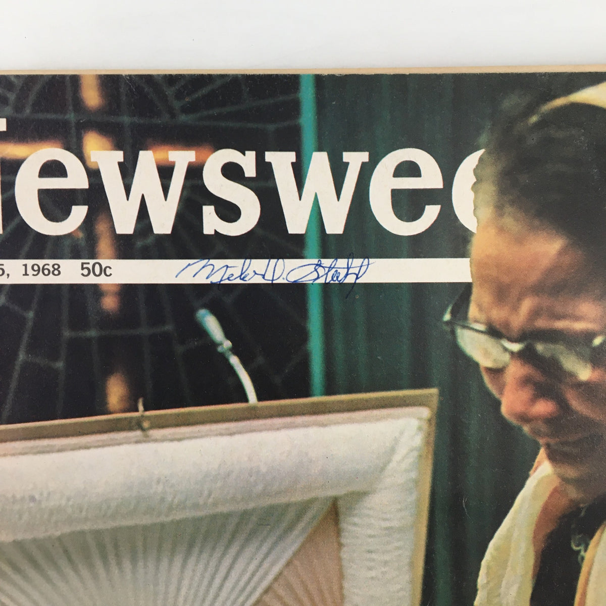 Close-up of the VTG Newsweek Magazine date and signature, highlighting the publication's vintage character.