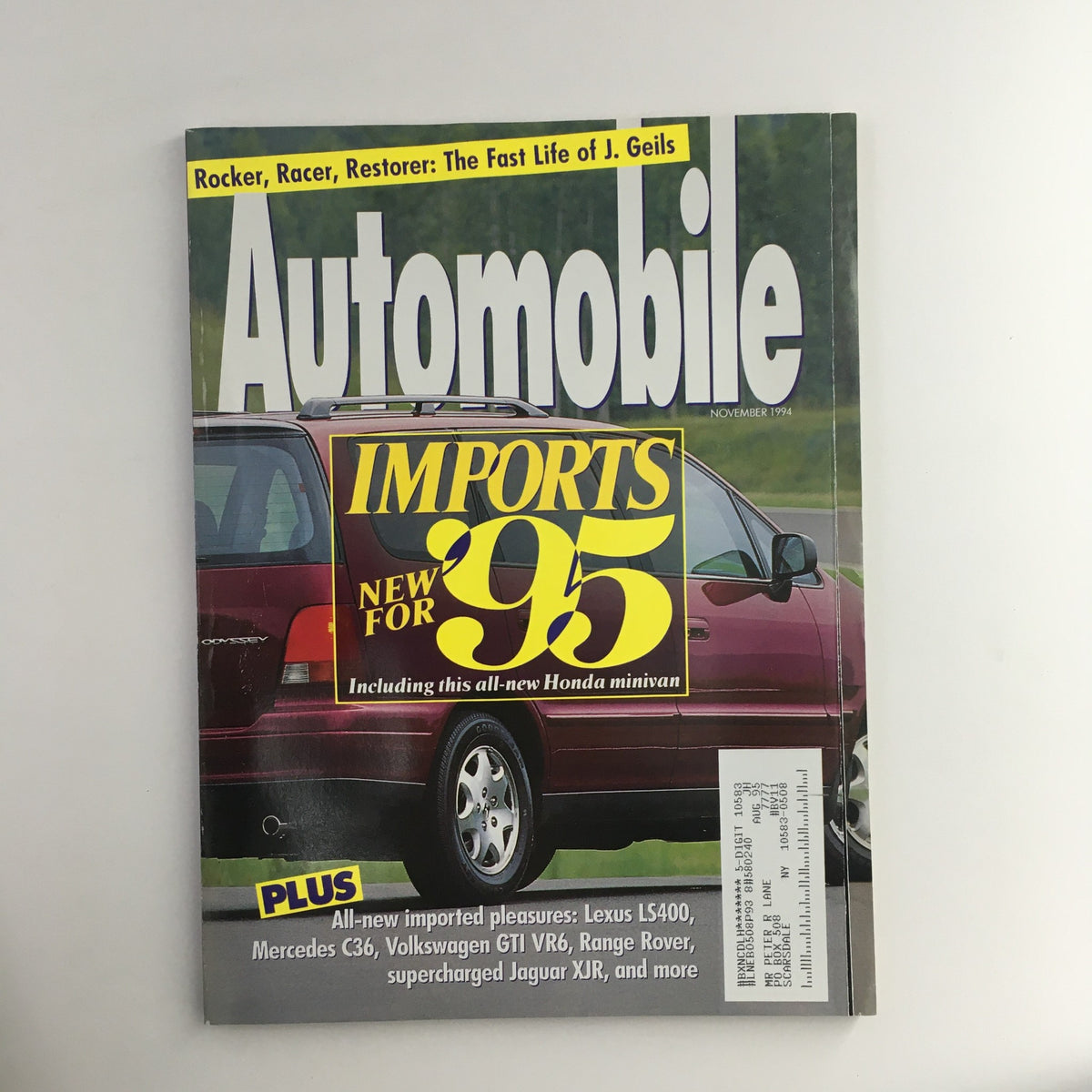 Cover of Automobile Magazine November 1994 featuring an in-depth look at the fast life of rocker and racer J. Geils, showcasing the latest imports for '95 including a new Honda minivan.