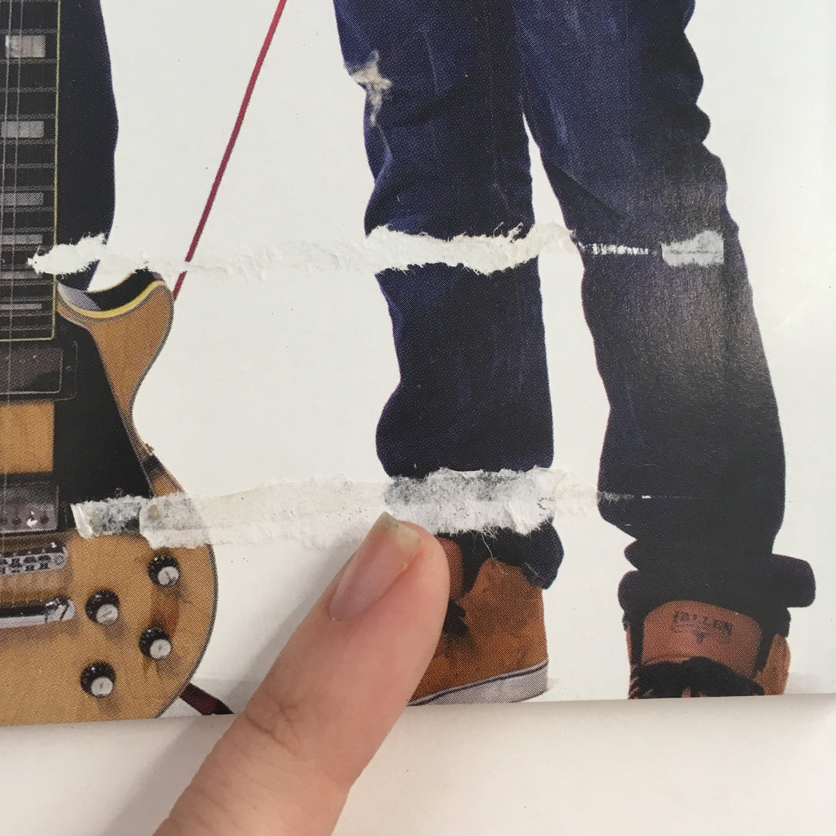 Close-up of the Guitar Player Magazine September 2009 featuring Joe Satriani and Sammy Hagar, highlighting minor wear on the magazine cover.