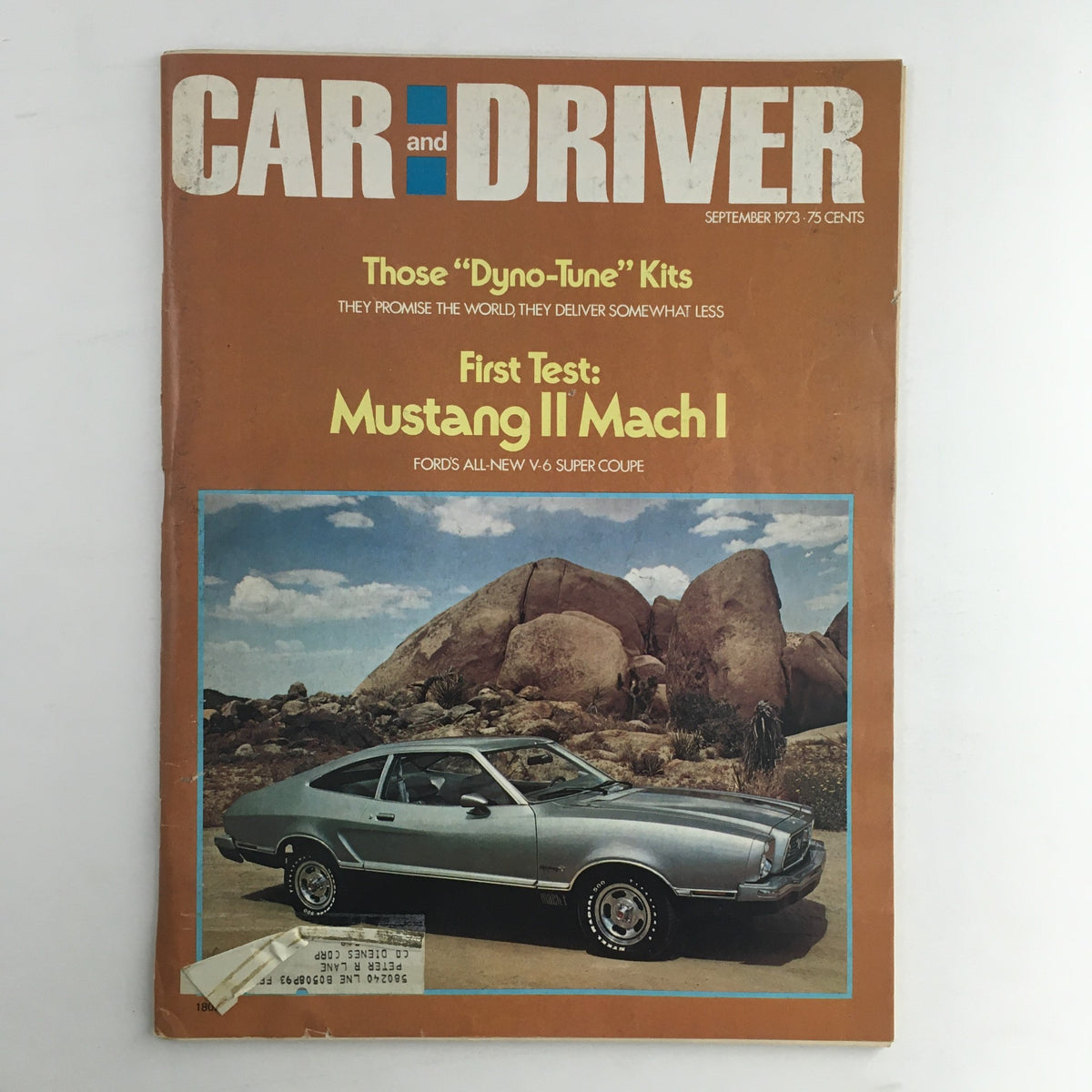 Cover of Car and Driver Magazine from September 1973 featuring articles on Dyno-Tune Kits and the Mustang II Mach I, showcasing a vintage automotive theme.