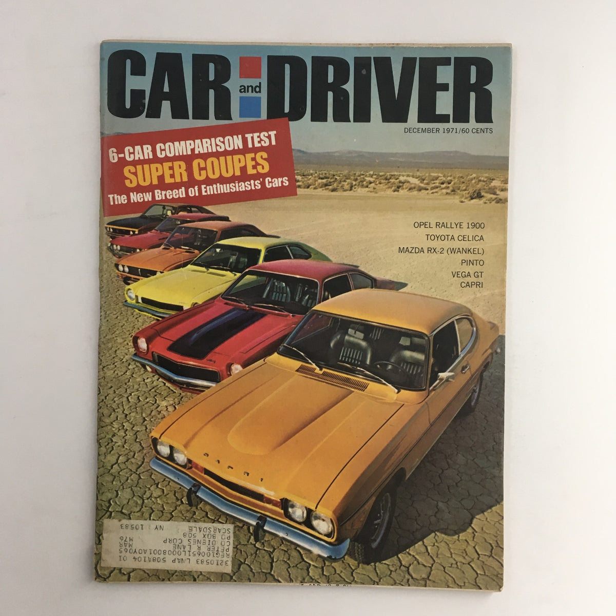 Cover of Car and Driver Magazine December 1971 featuring a colorful line-up of cars including Opel Rallye 1900, Toyota Celica, and Mazda RX2, with a '6-Car Comparison Test' headline.