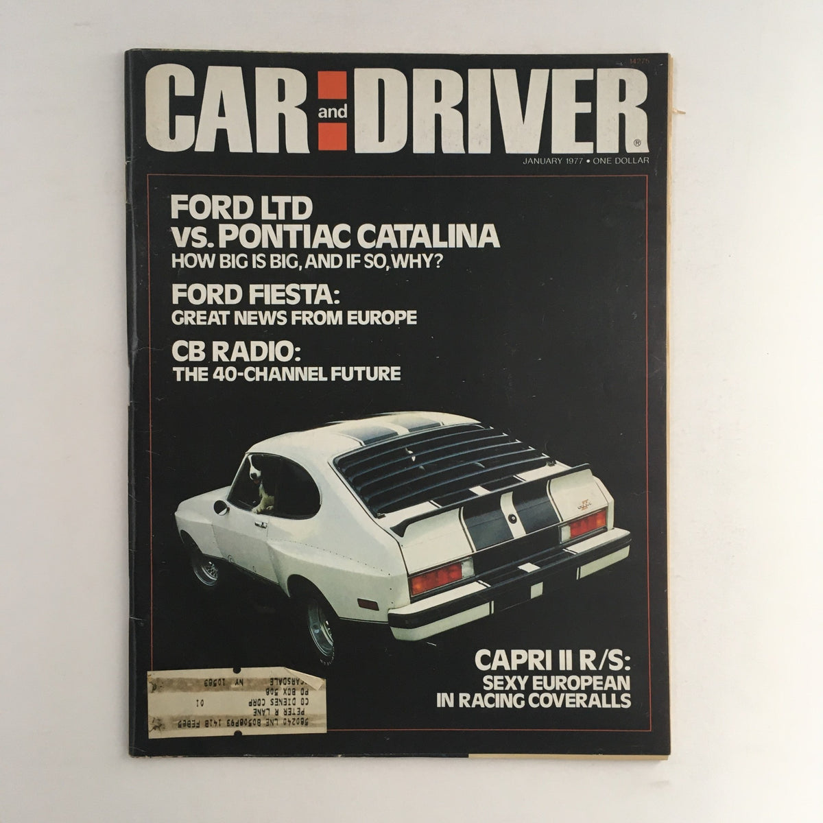 Cover of Car and Driver Magazine January 1977 featuring Ford Ltd vs Pontiac Catalina comparison, with highlights on Ford Fiesta and CB Radio, showcasing a vintage automotive theme.