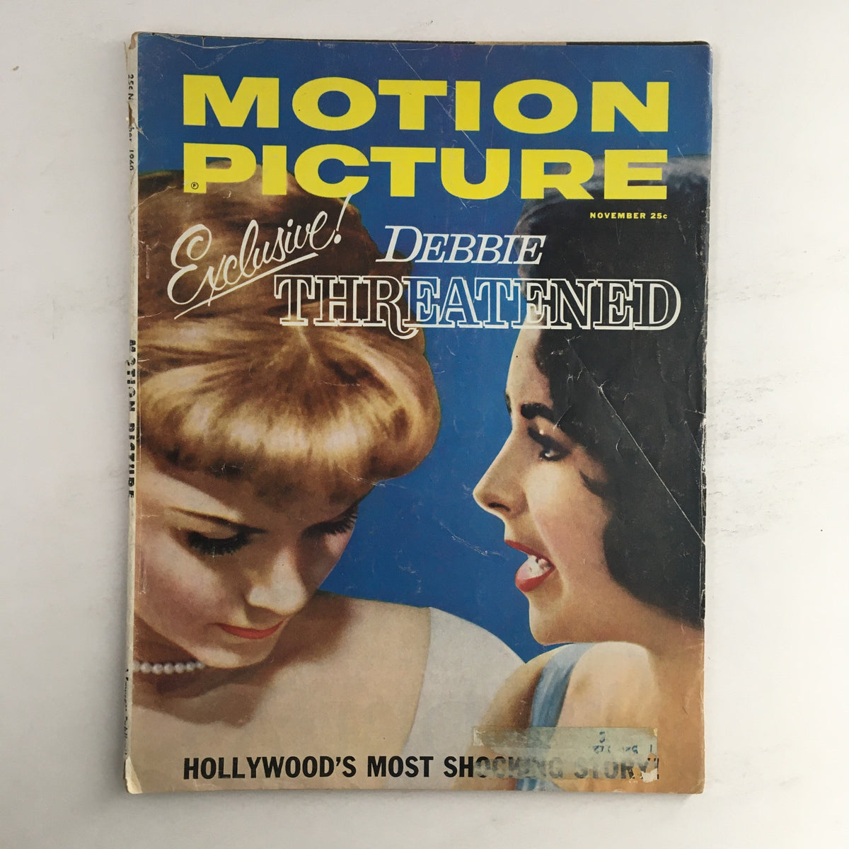 Motion Picture Magazine cover from November 1960 featuring Debbie Reynolds and Elizabeth Taylor, showcasing the glamorous style of Hollywood's golden age.