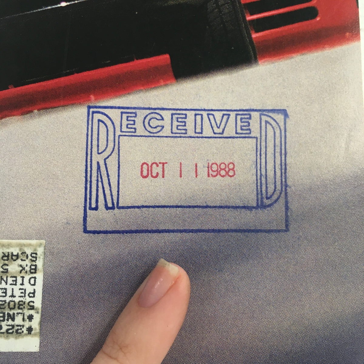 Close-up of the received date stamp on Road & Track Magazine November 1988, dated October 11, 1988, enhancing its collectible value.