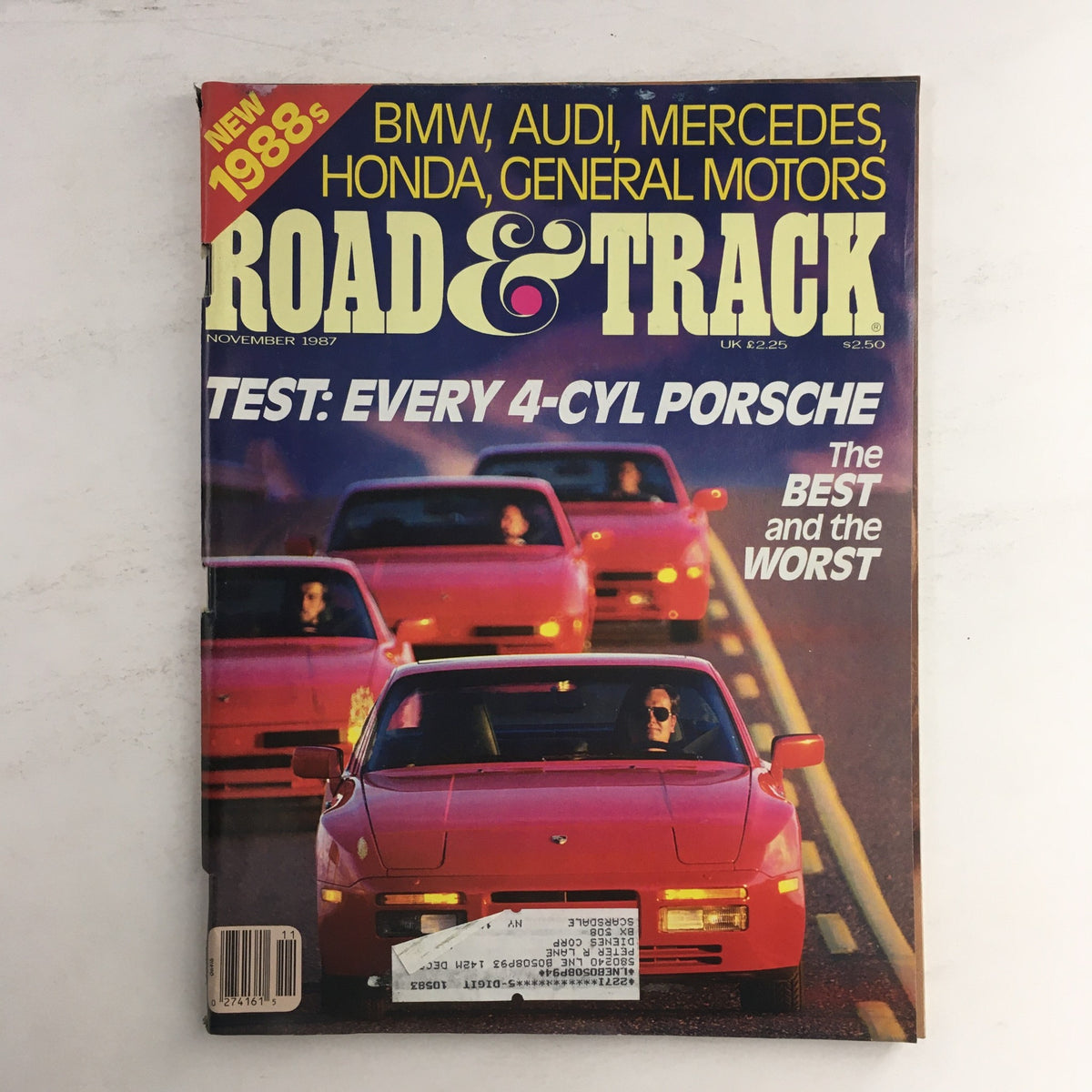 Cover of the Road & Track Magazine November 1987 featuring BMW, Audi, Mercedes, Honda, and General Motors with a focus on testing every 4-cylinder Porsche.