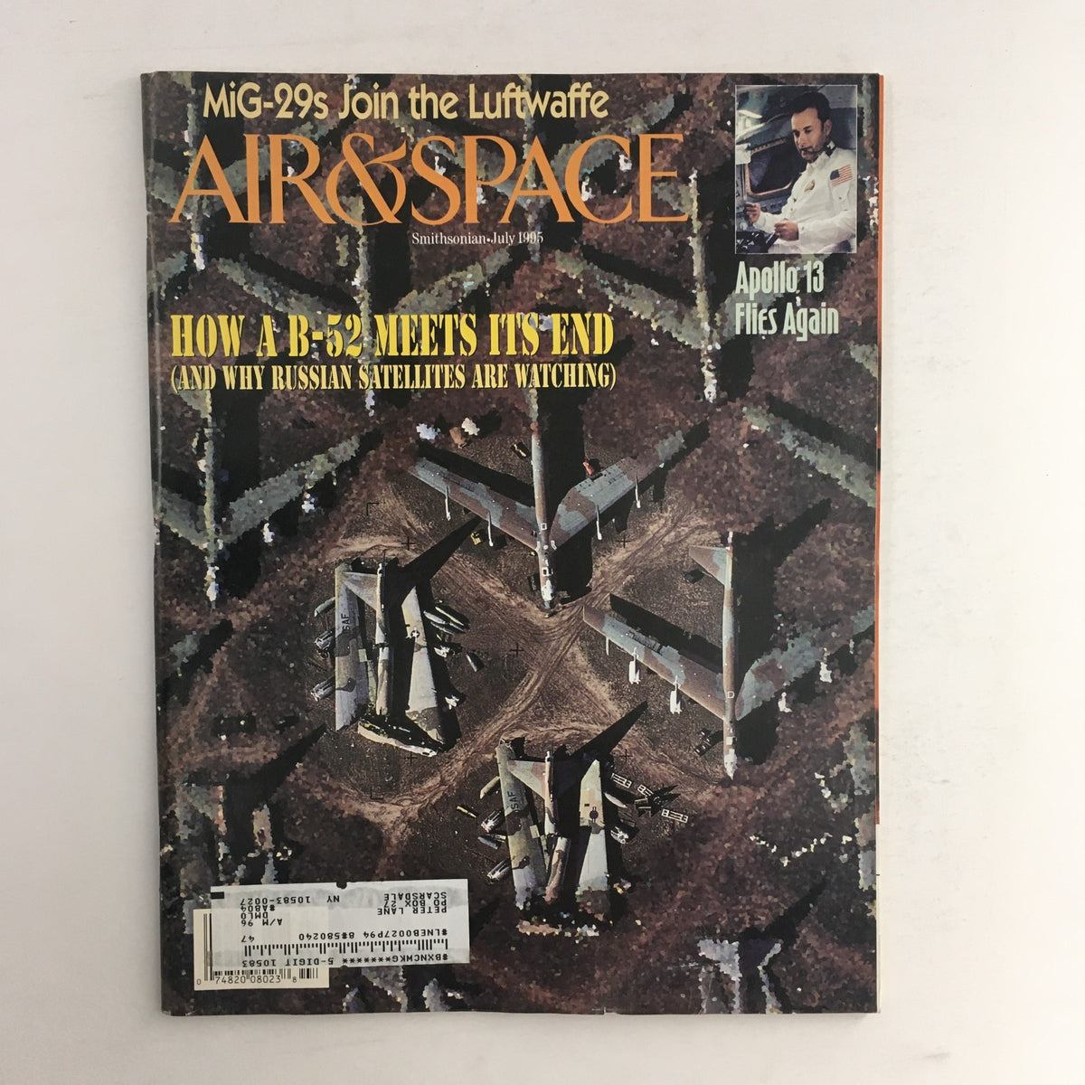 Air & Space Smithsonian Magazine July 1995 cover showcasing an article on the Apollo 13 mission with aerial imagery of military aircraft featured prominently and a subtitle discussing B-52s.