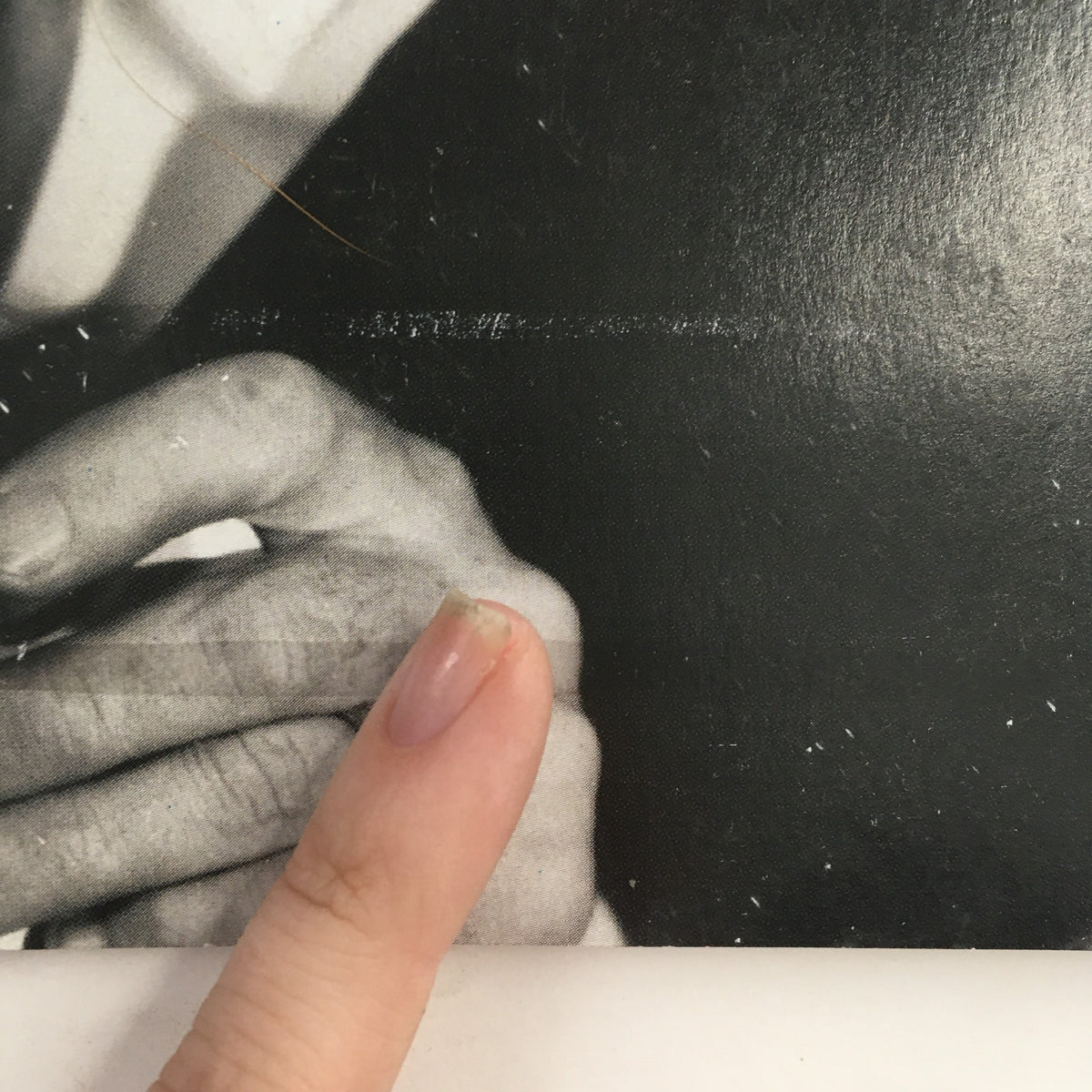 Close-up of the cover of Guitar Player Magazine December 2009, showing a musician's hand pointing to a detail on the magazine featuring Les Paul and a Beatles music lesson.