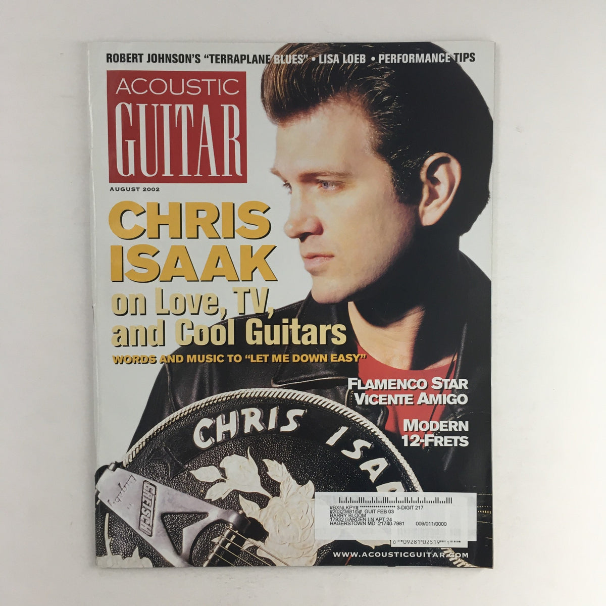 Cover of Acoustic Guitar Magazine from August 2002 featuring Chris Isaak on Love, TV, and Cool Guitars with flamenco star Vicente Amigo, showcasing vintage guitar culture.